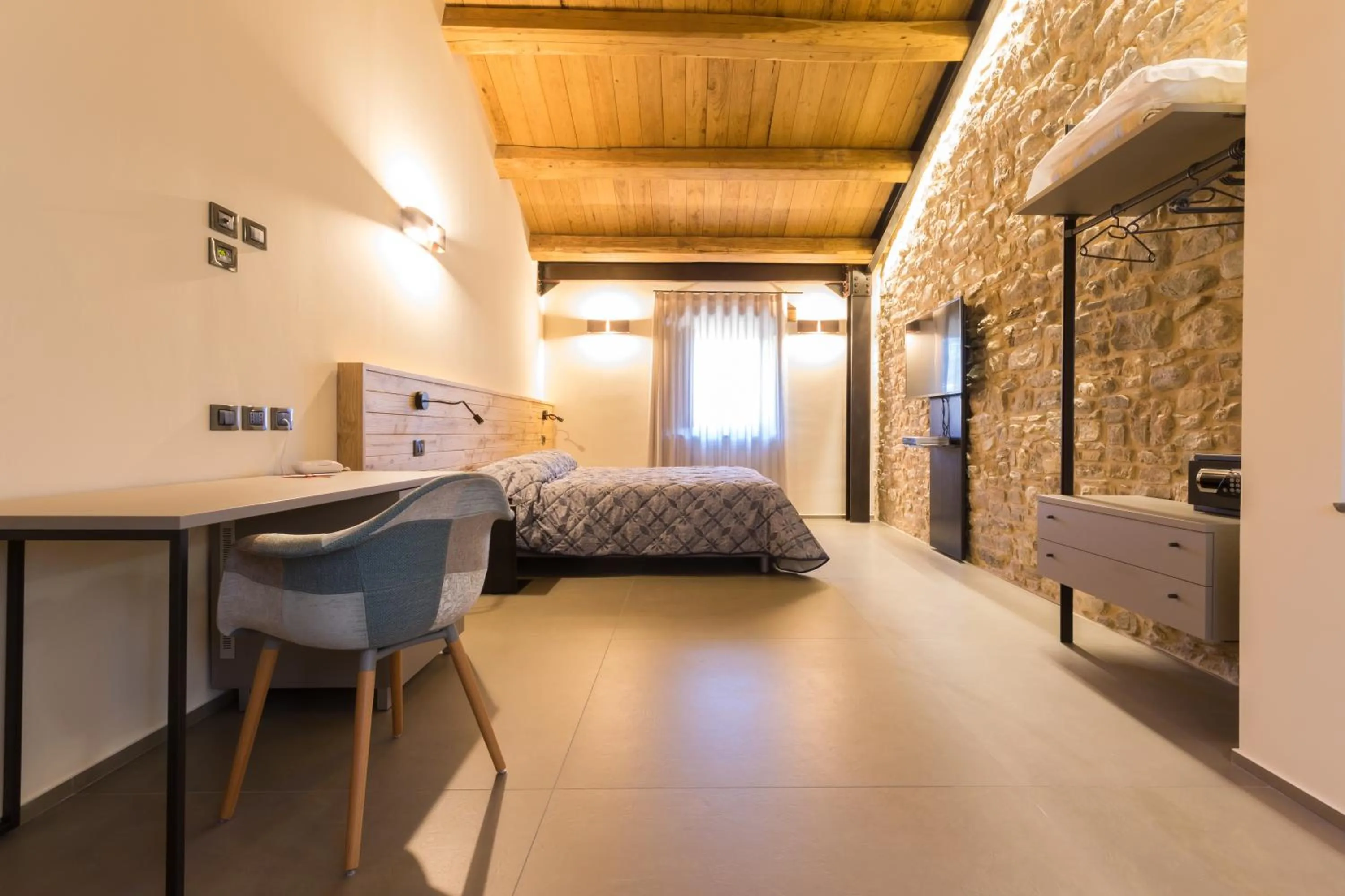 Photo of the whole room, Bed in Borgotufi Albergo Diffuso