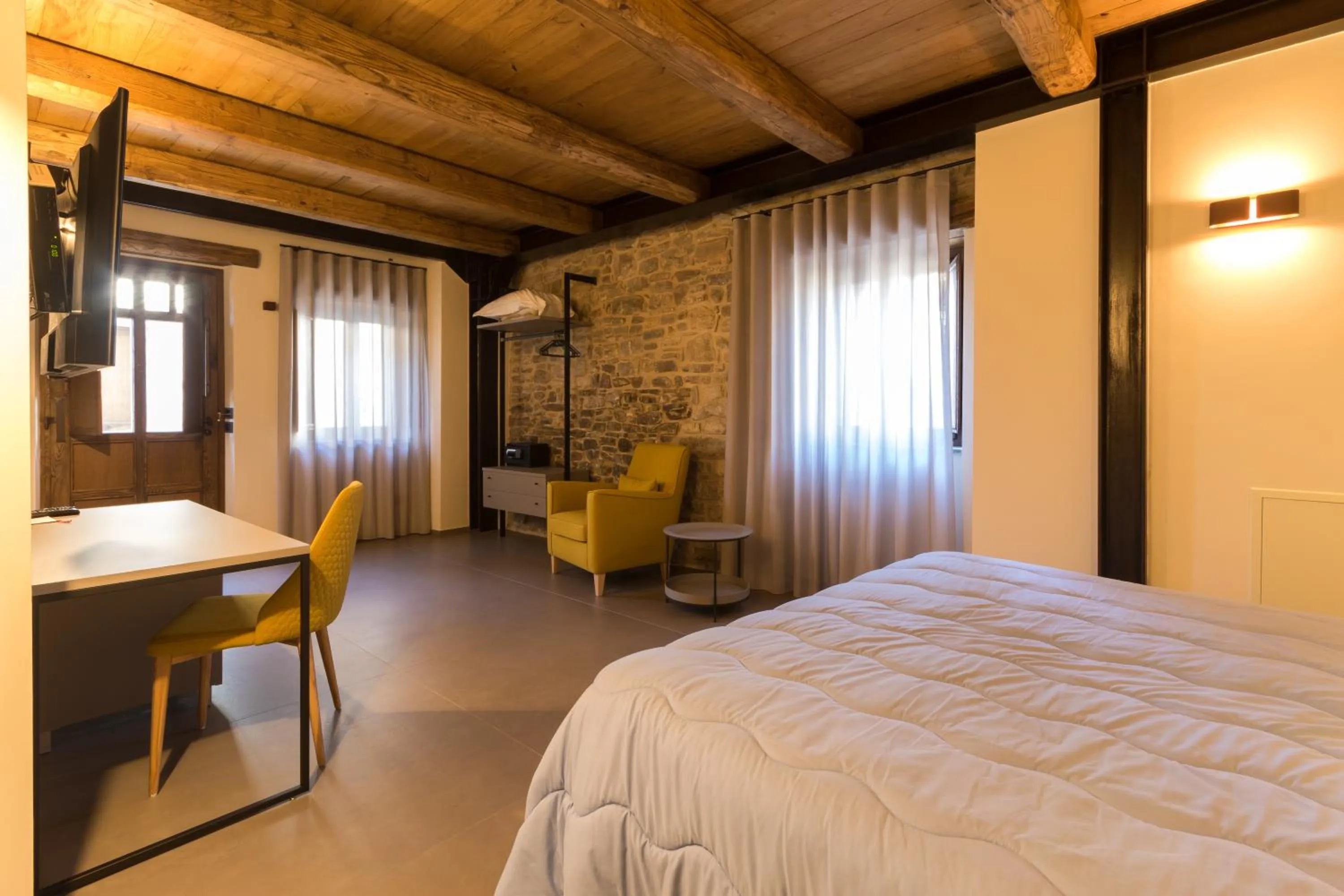 Bed in Borgotufi Albergo Diffuso