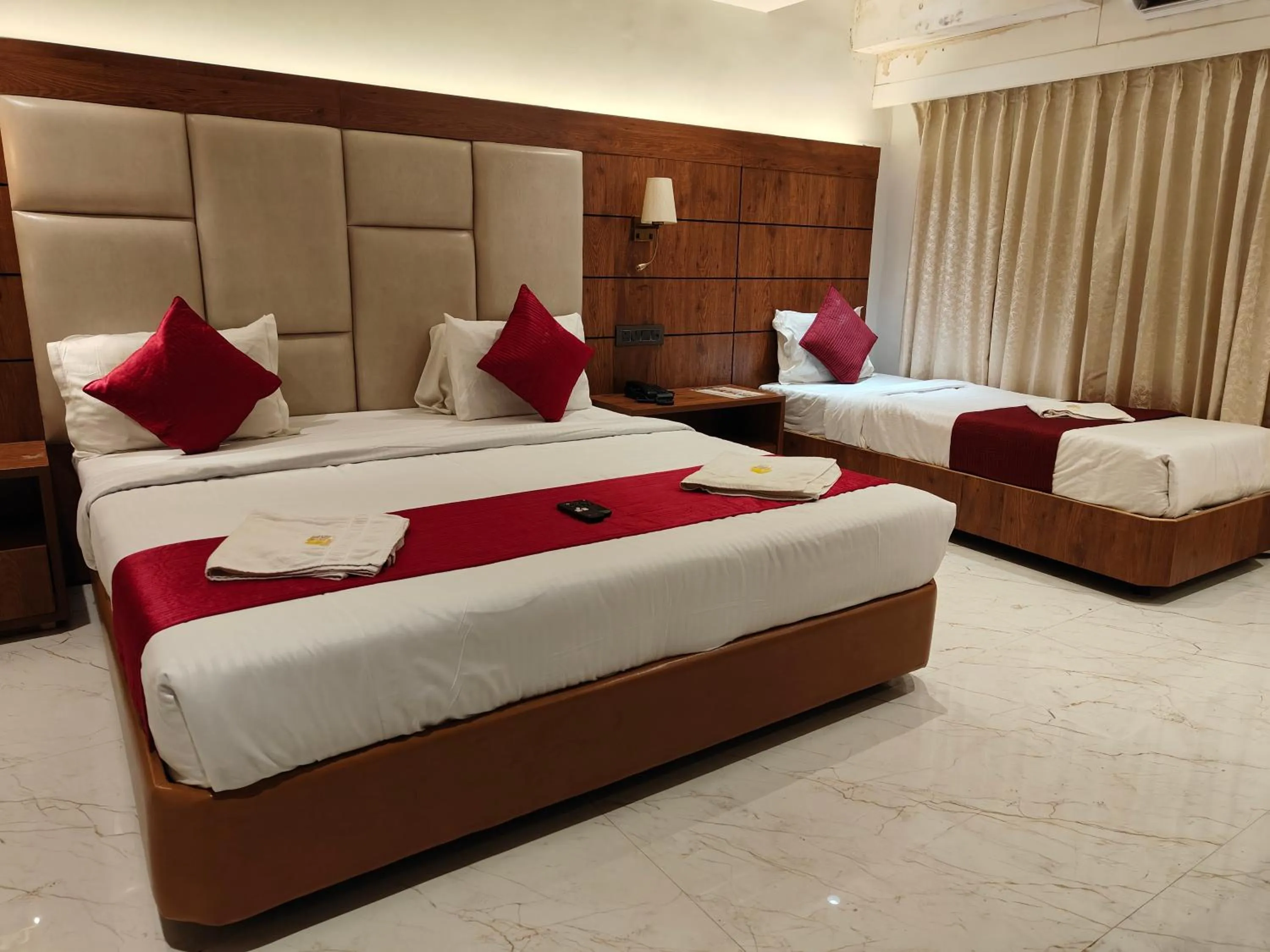 Bed in Hotel Anand Palace