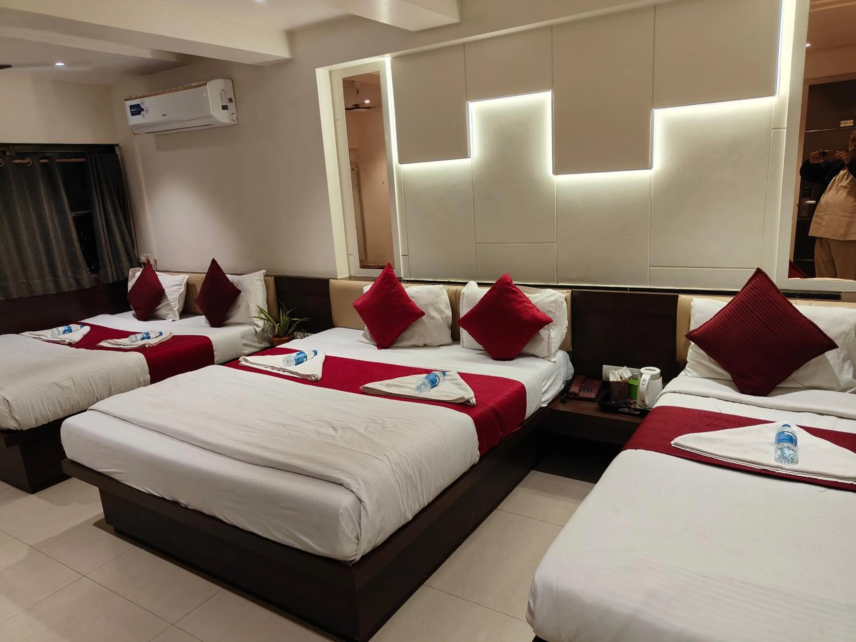 Bed in Hotel Anand Palace