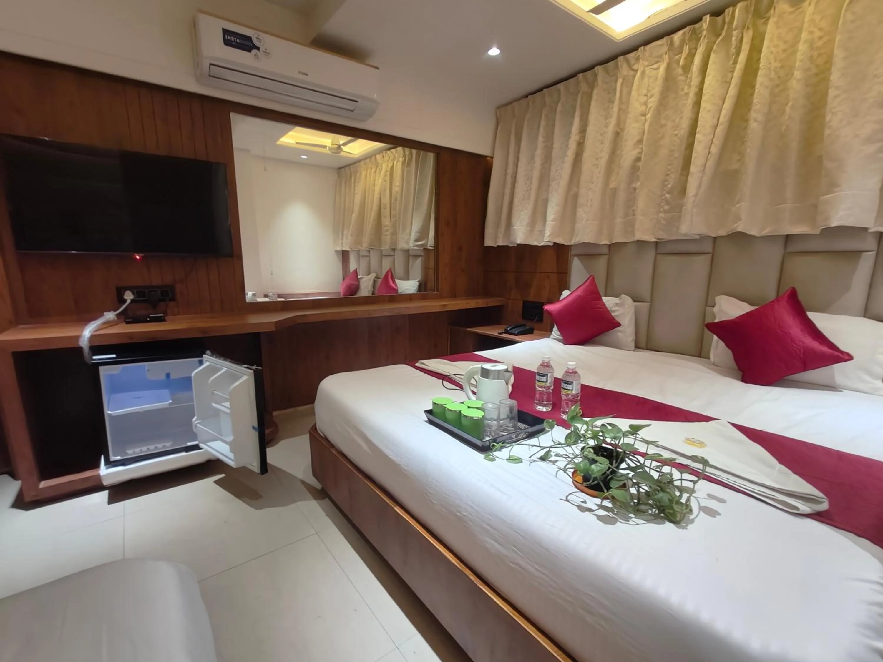 Bed in Hotel Anand Palace