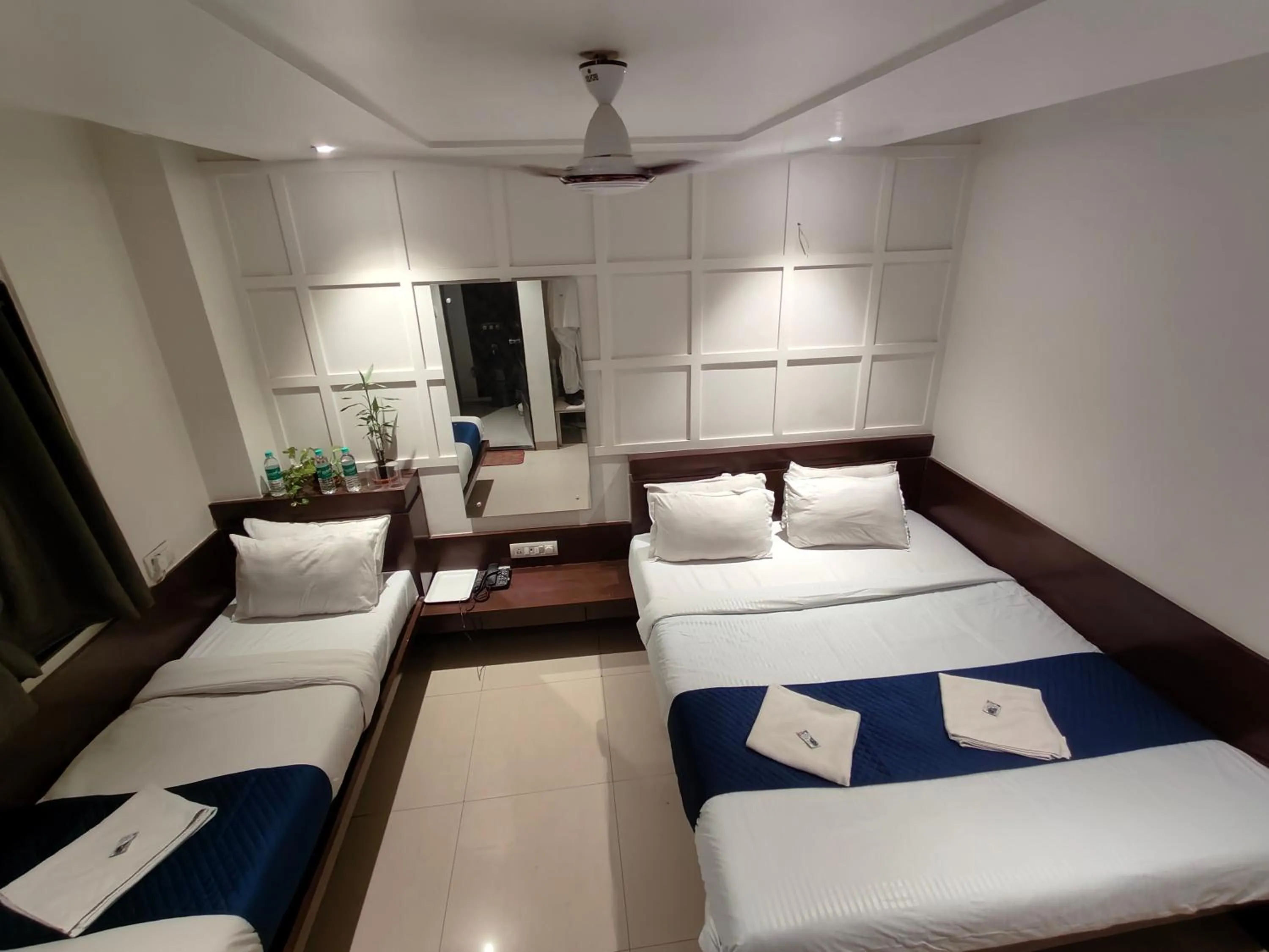 Bed in Hotel Anand Palace