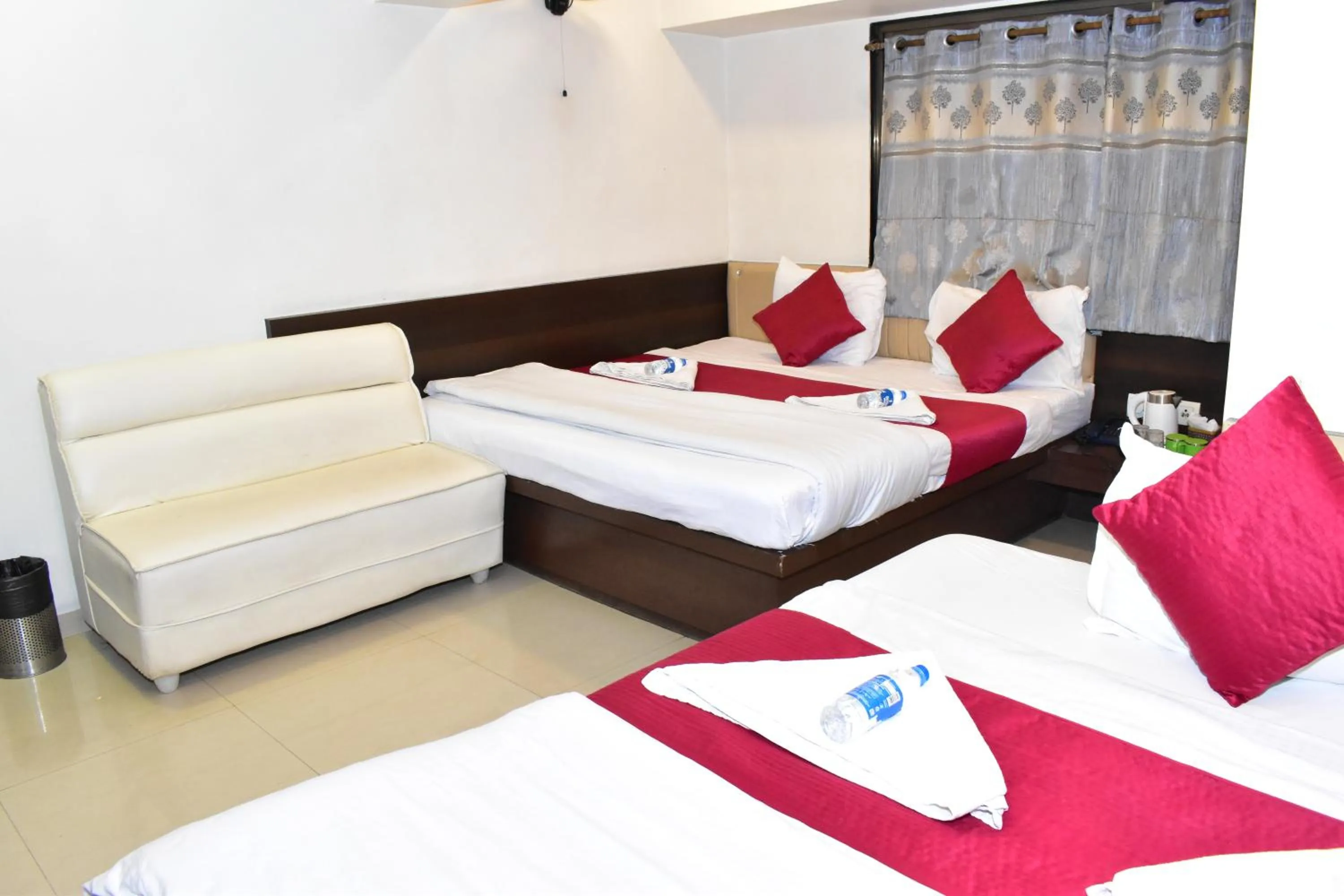 Bed in Hotel Anand Palace