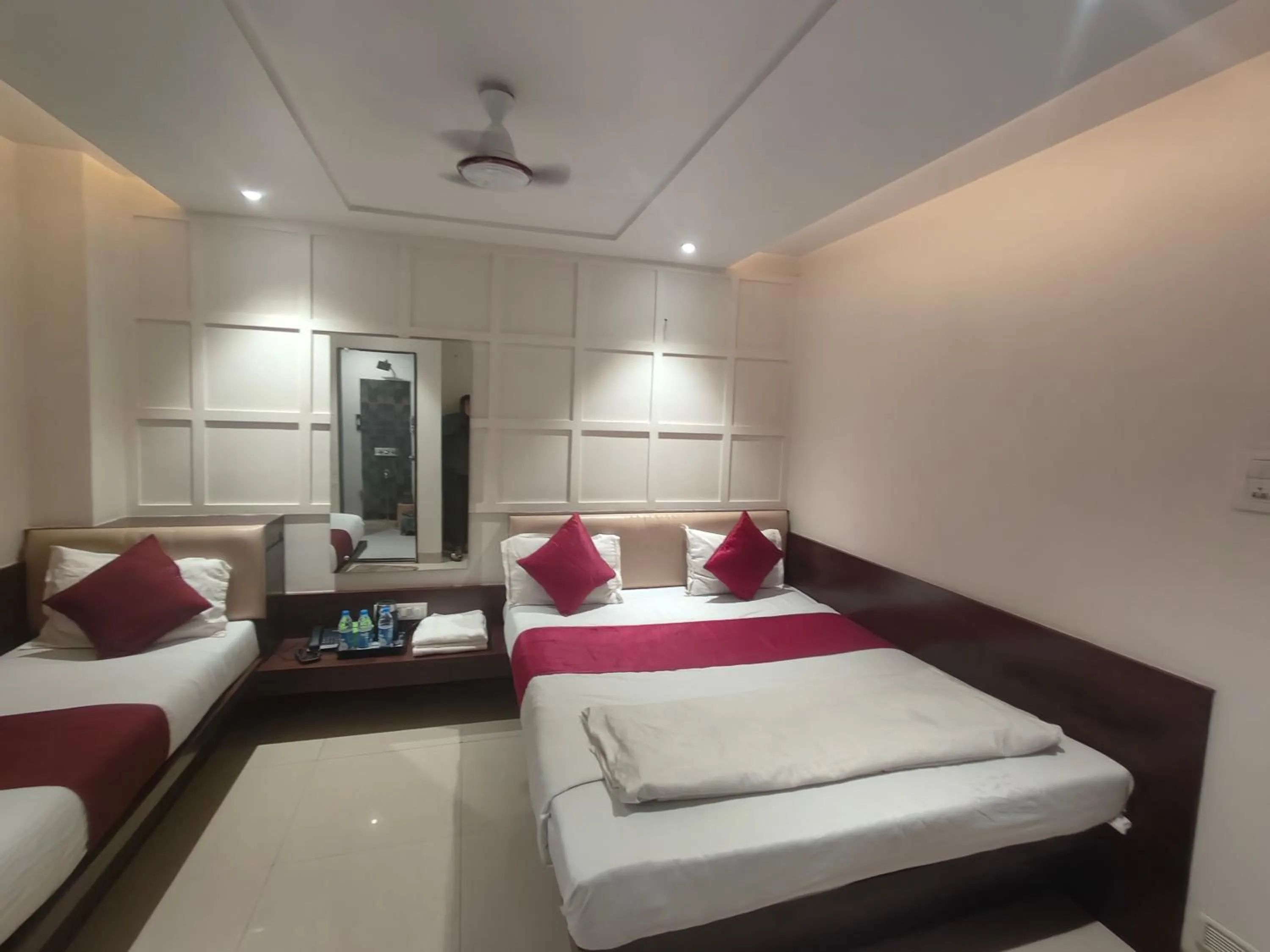 Bed in Hotel Anand Palace