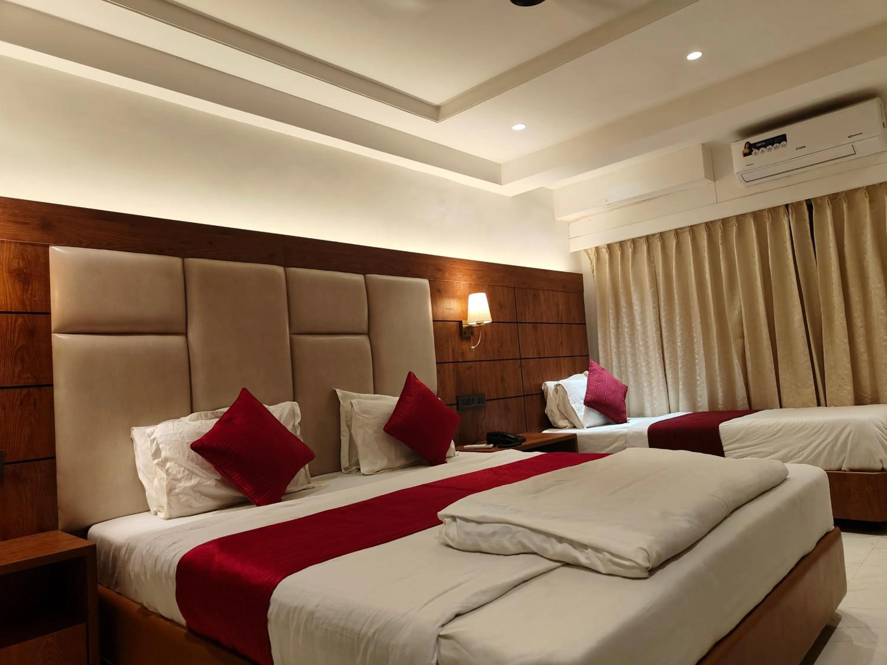 Bed in Hotel Anand Palace