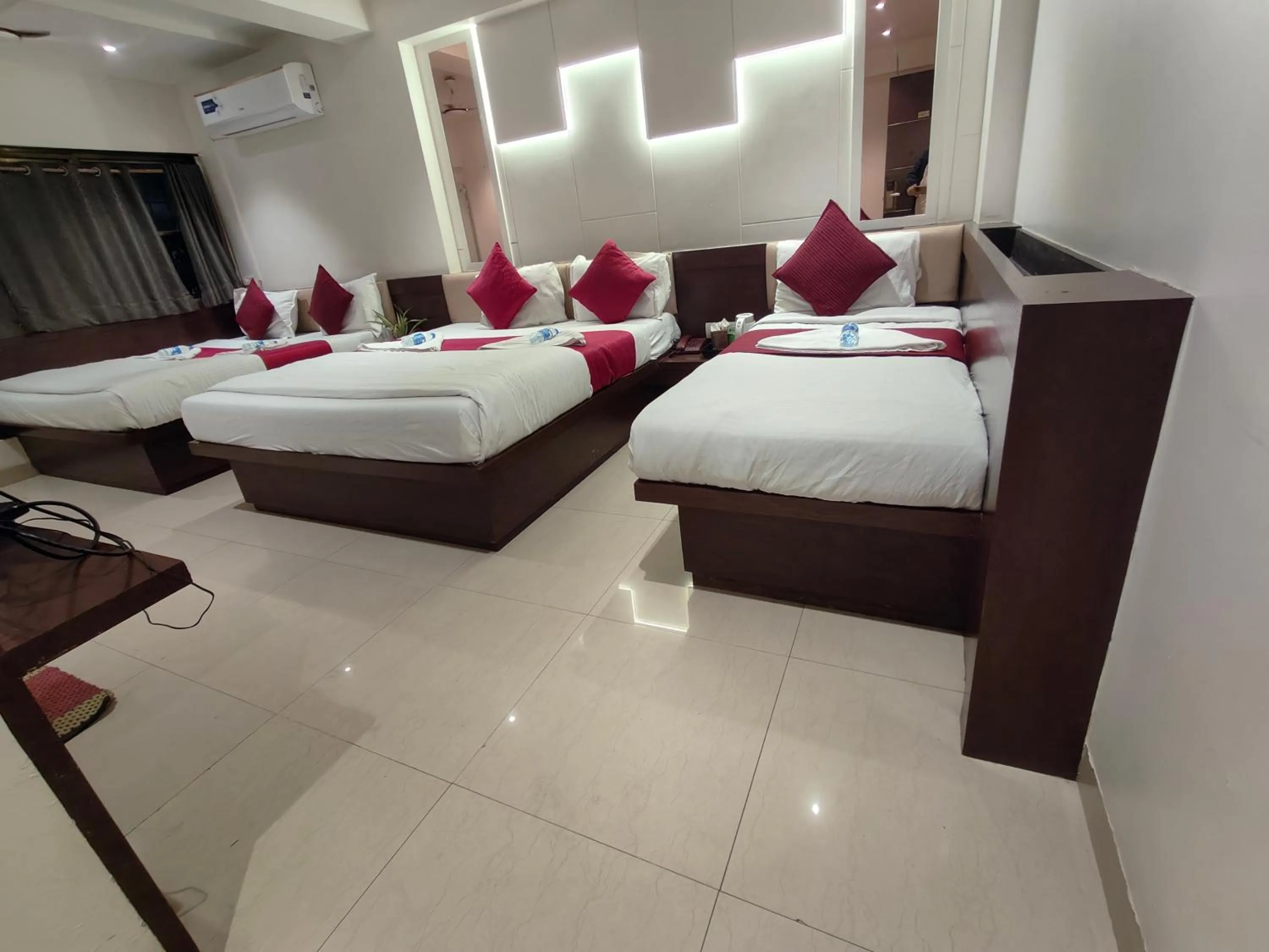 Bed in Hotel Anand Palace