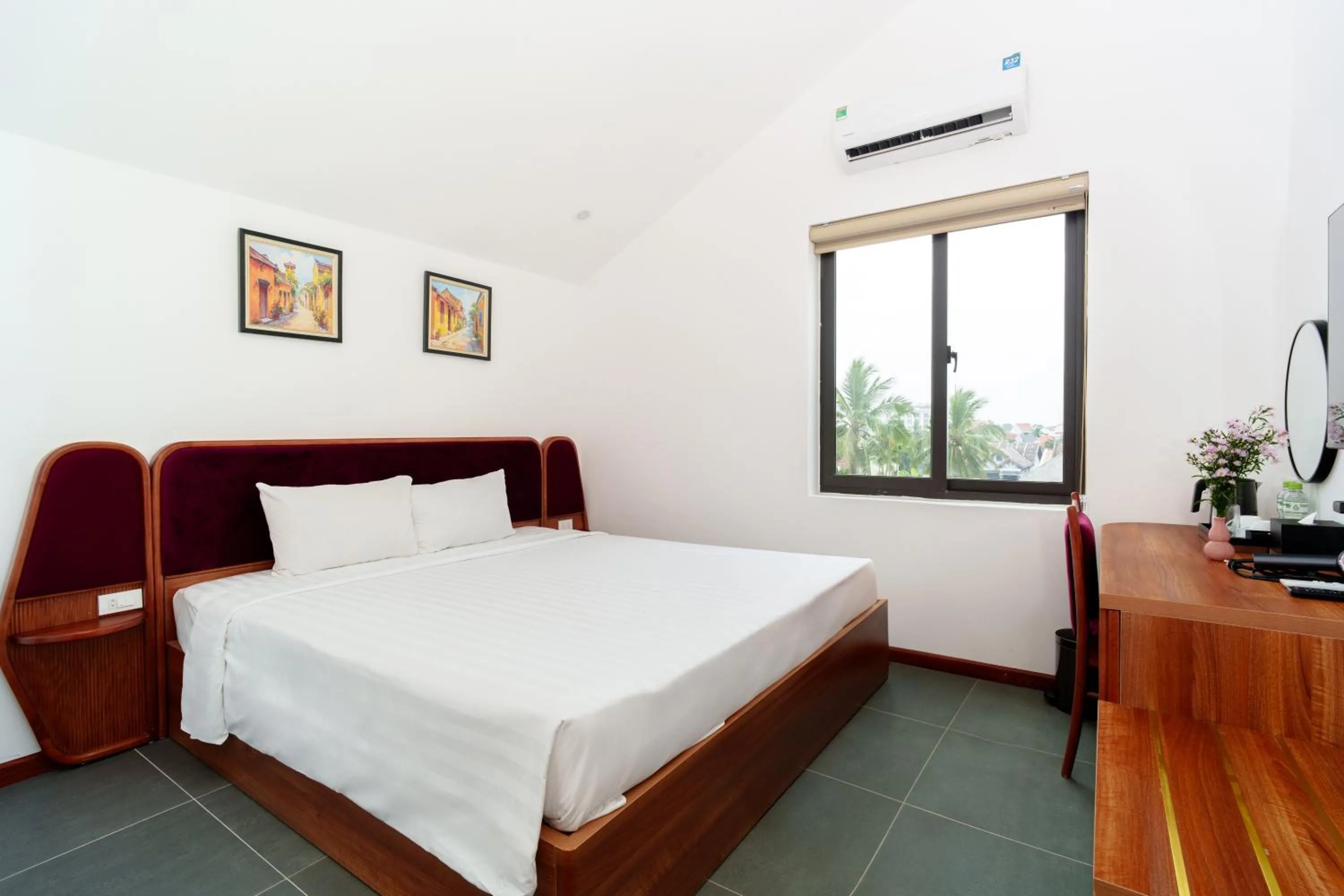 Bed in Serene Riverside Hotel Hoi An