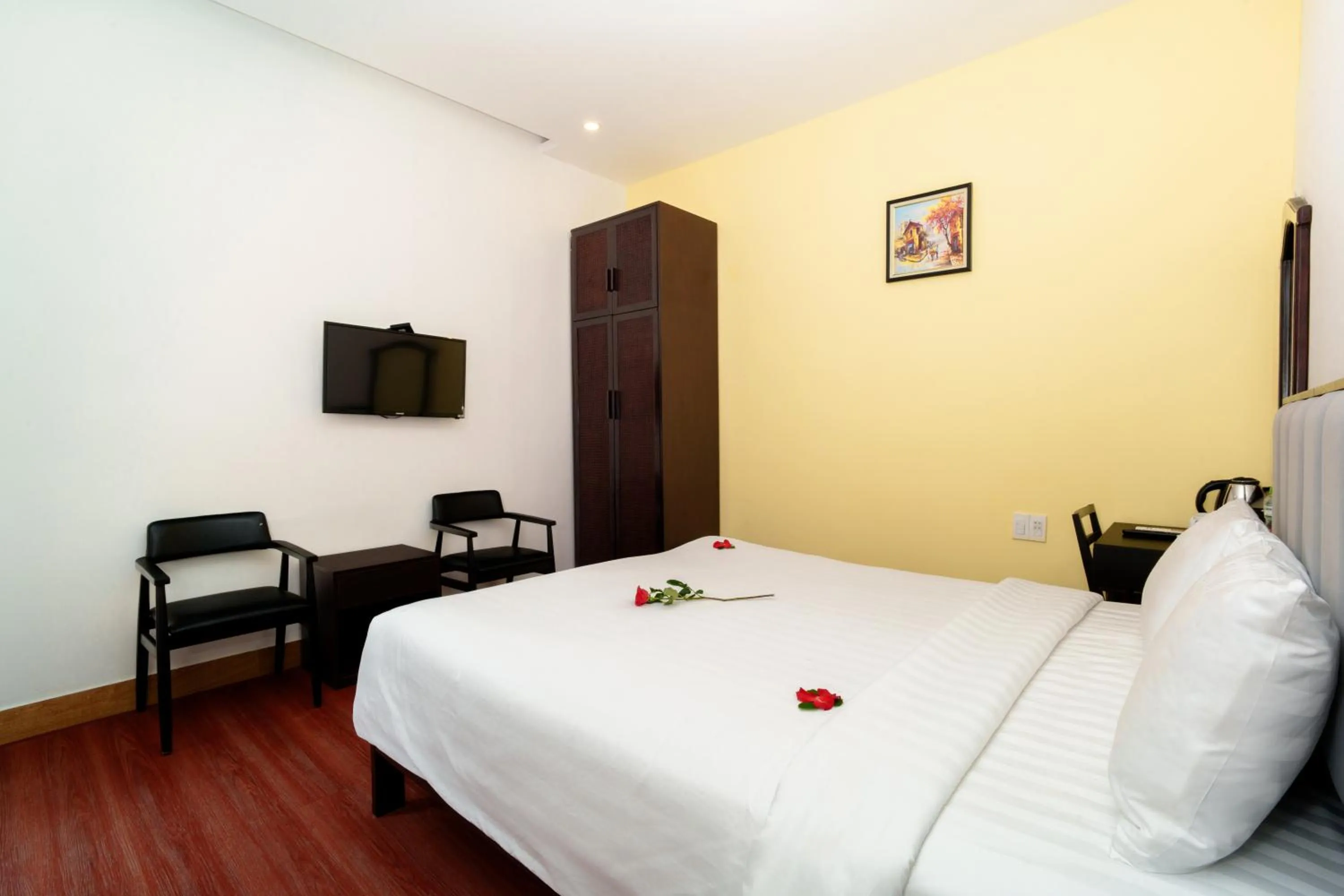 Photo of the whole room, Bed in Serene Riverside Hotel Hoi An