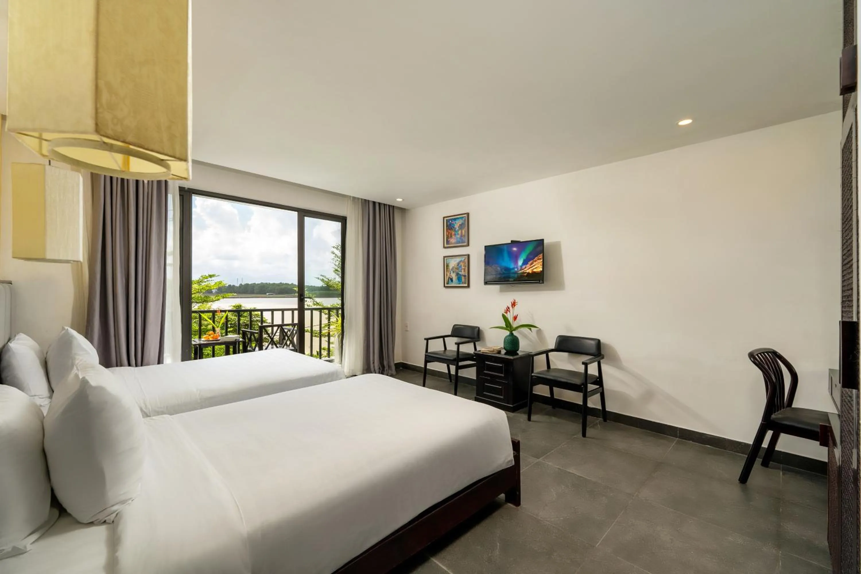 Photo of the whole room, Bed in Gia Huy Riverside Hotel Hoi An