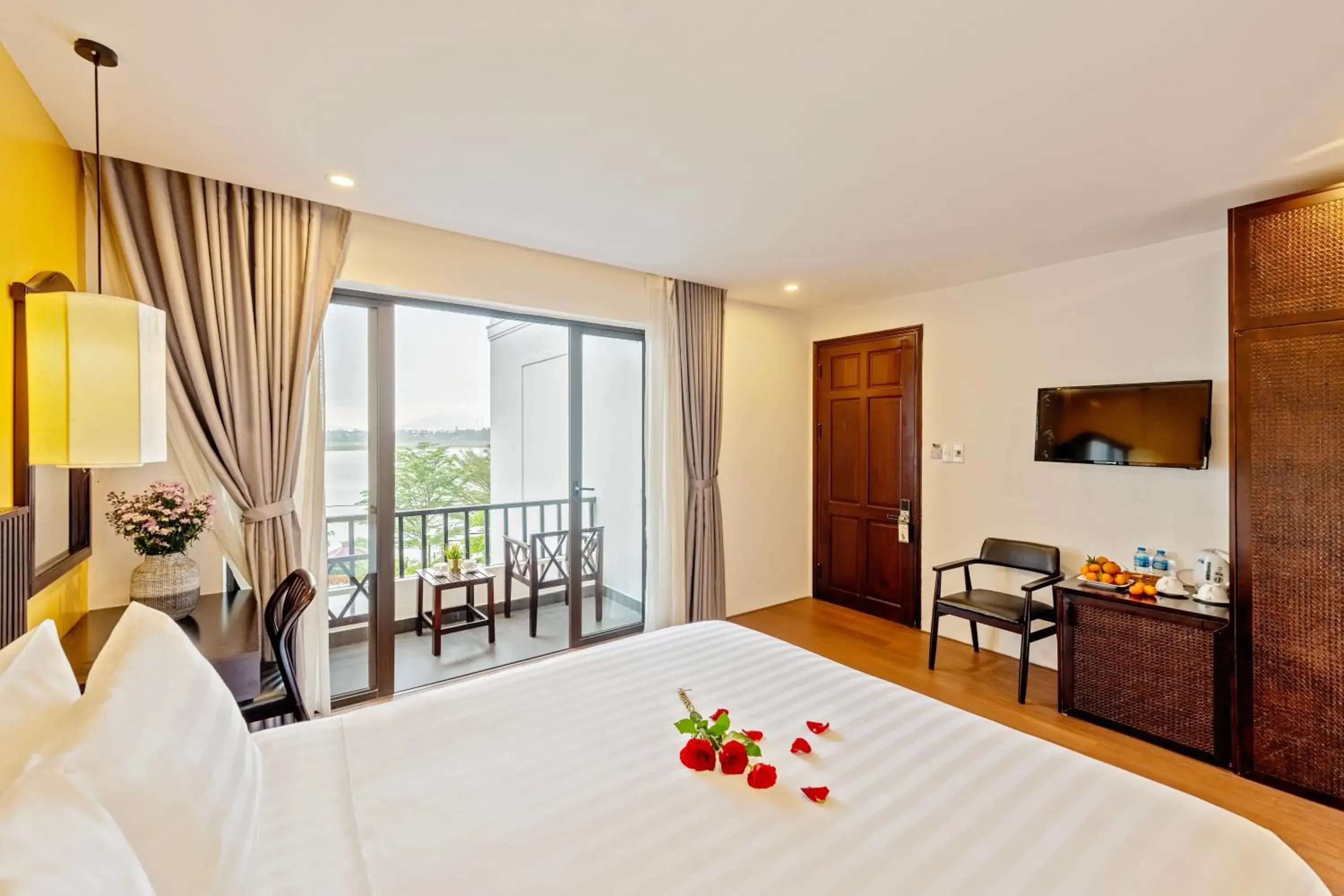 Deluxe Double Room with Balcony in Serene Riverside Hotel Hoi An Deluxe Double Room with Balcony in Serene Riverside Hotel Hoi An