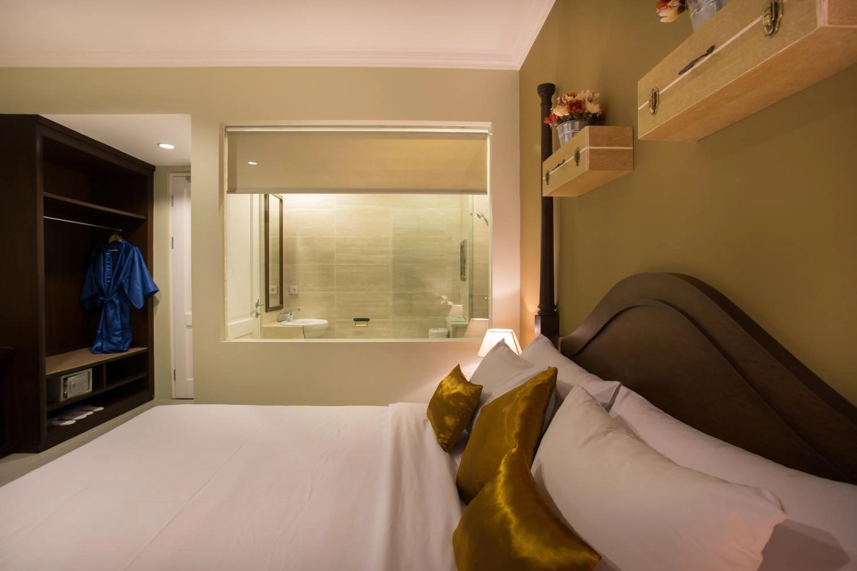 Bed in Amalfi Hotel Seminyak