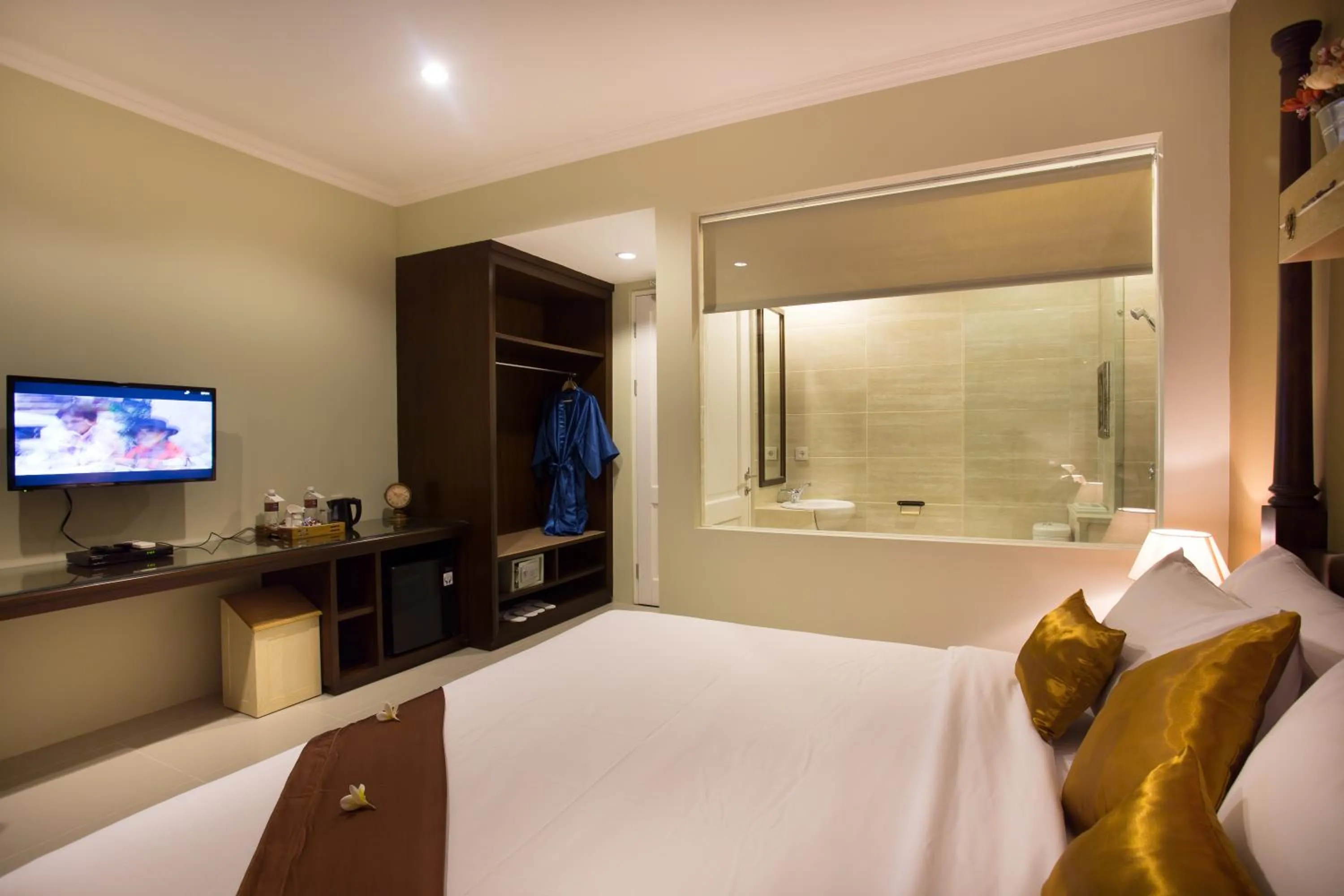 Bed in Amalfi Hotel Seminyak