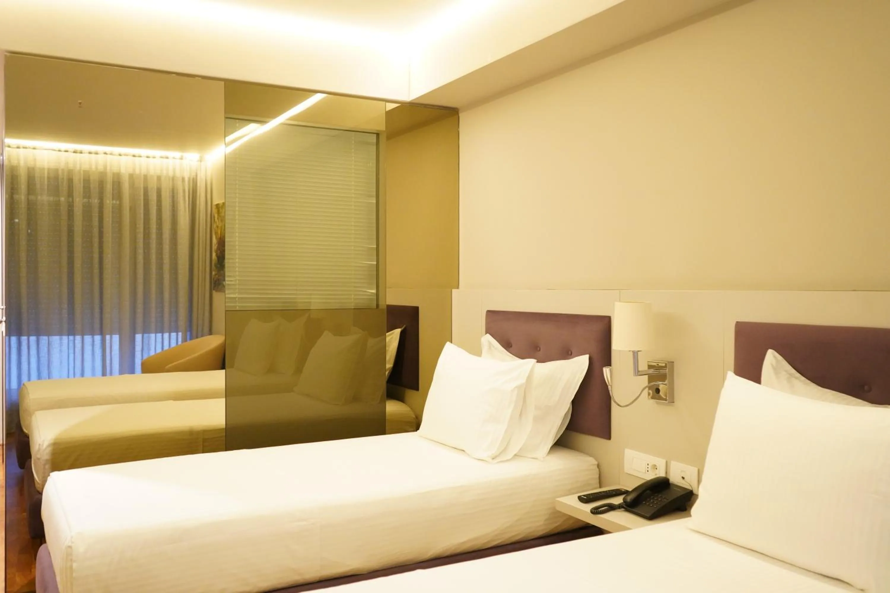 Bed in Bougainville Bay Hotel