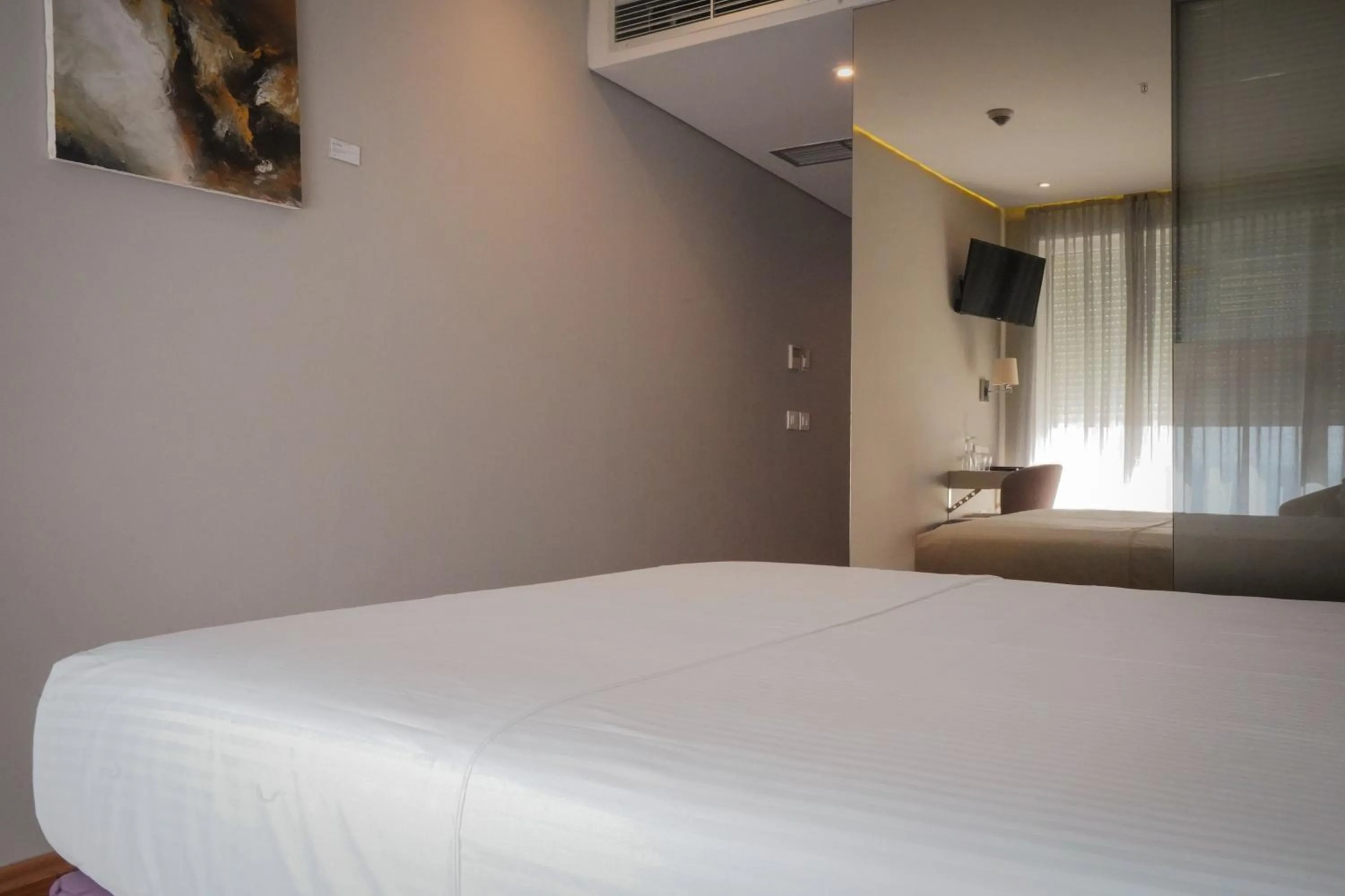 Bed in Bougainville Bay Hotel