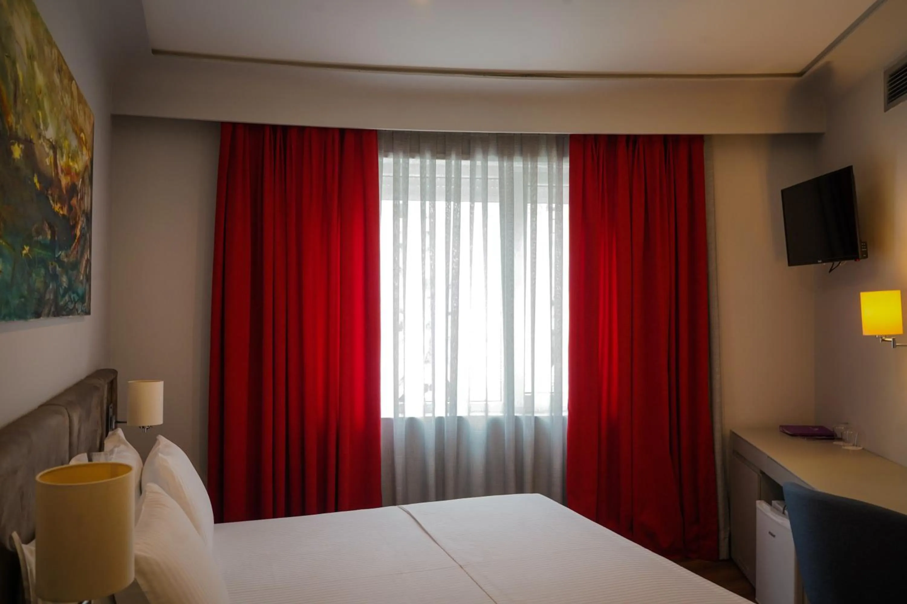 Bed in Bougainville Bay Hotel