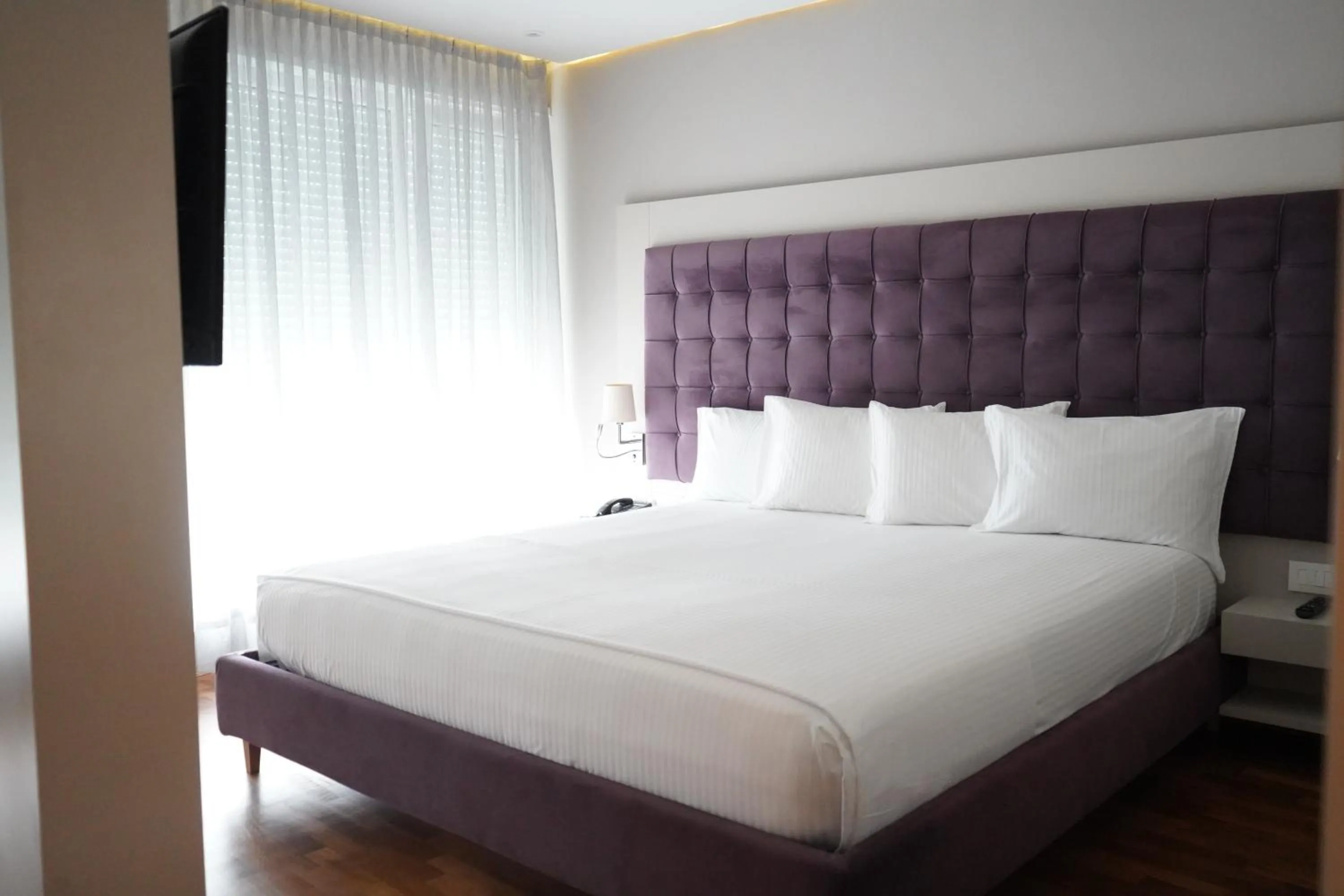 Bed in Bougainville Bay Hotel