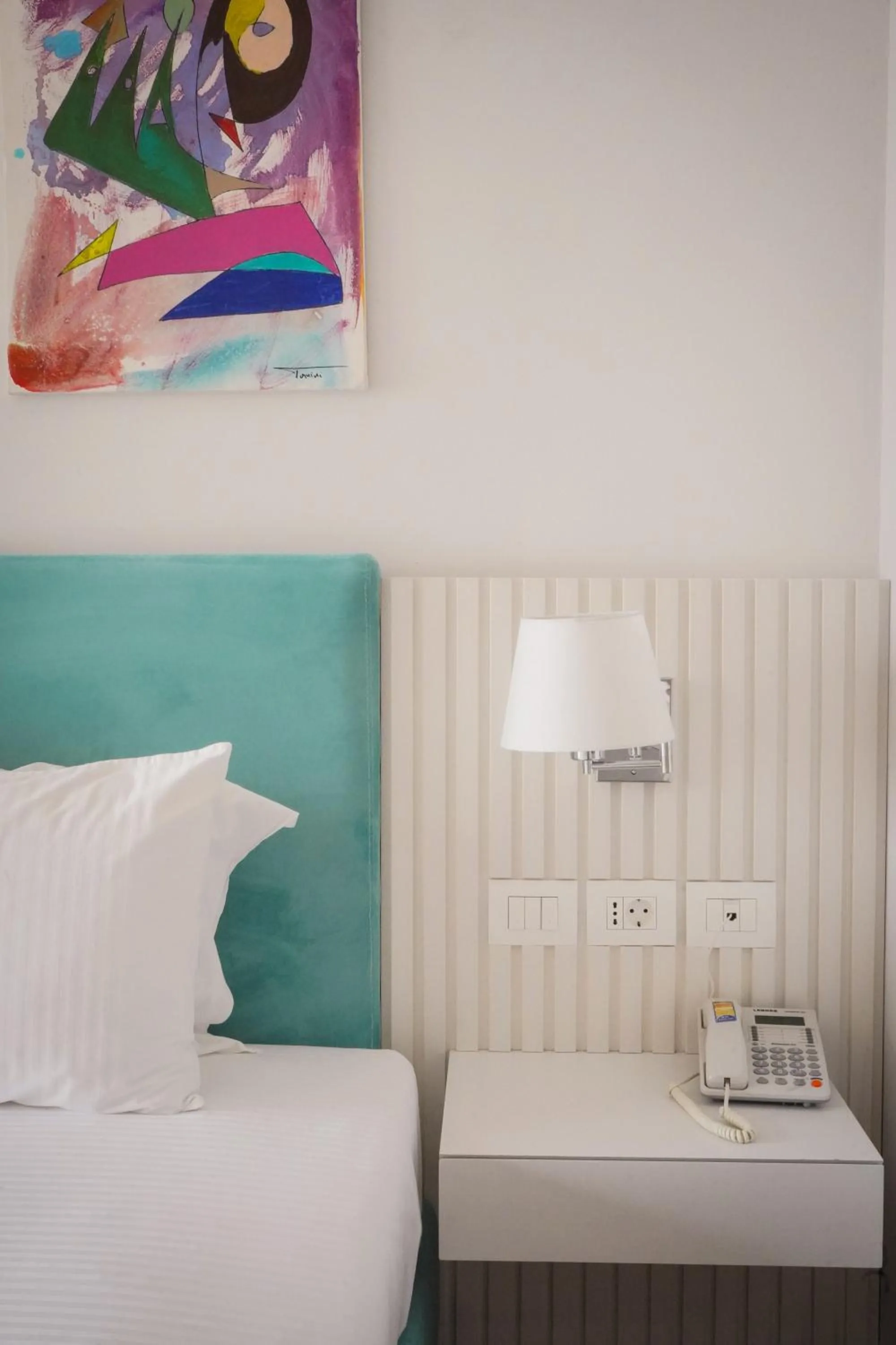 Bed in Bougainville Bay Hotel