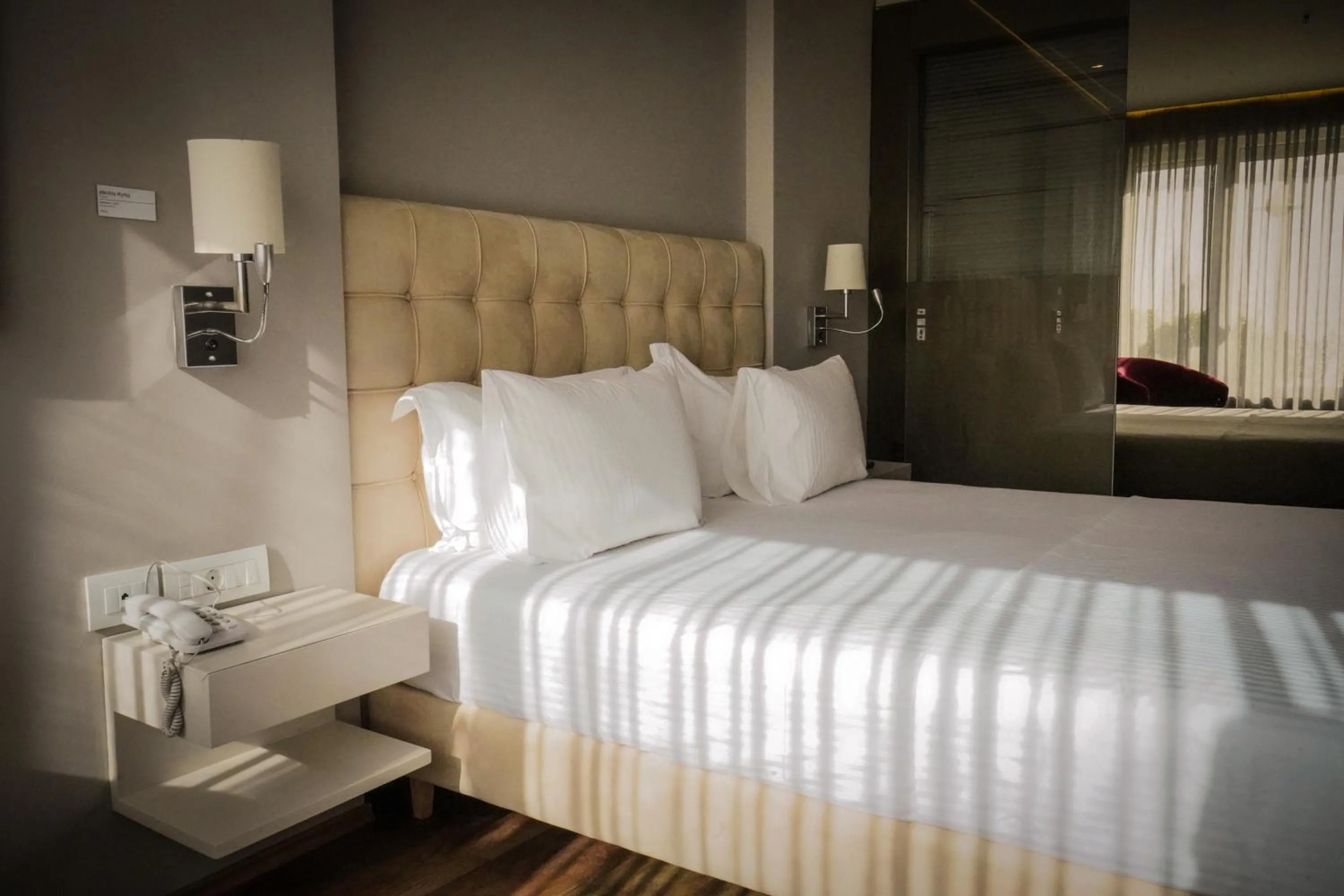 Bed in Bougainville Bay Hotel