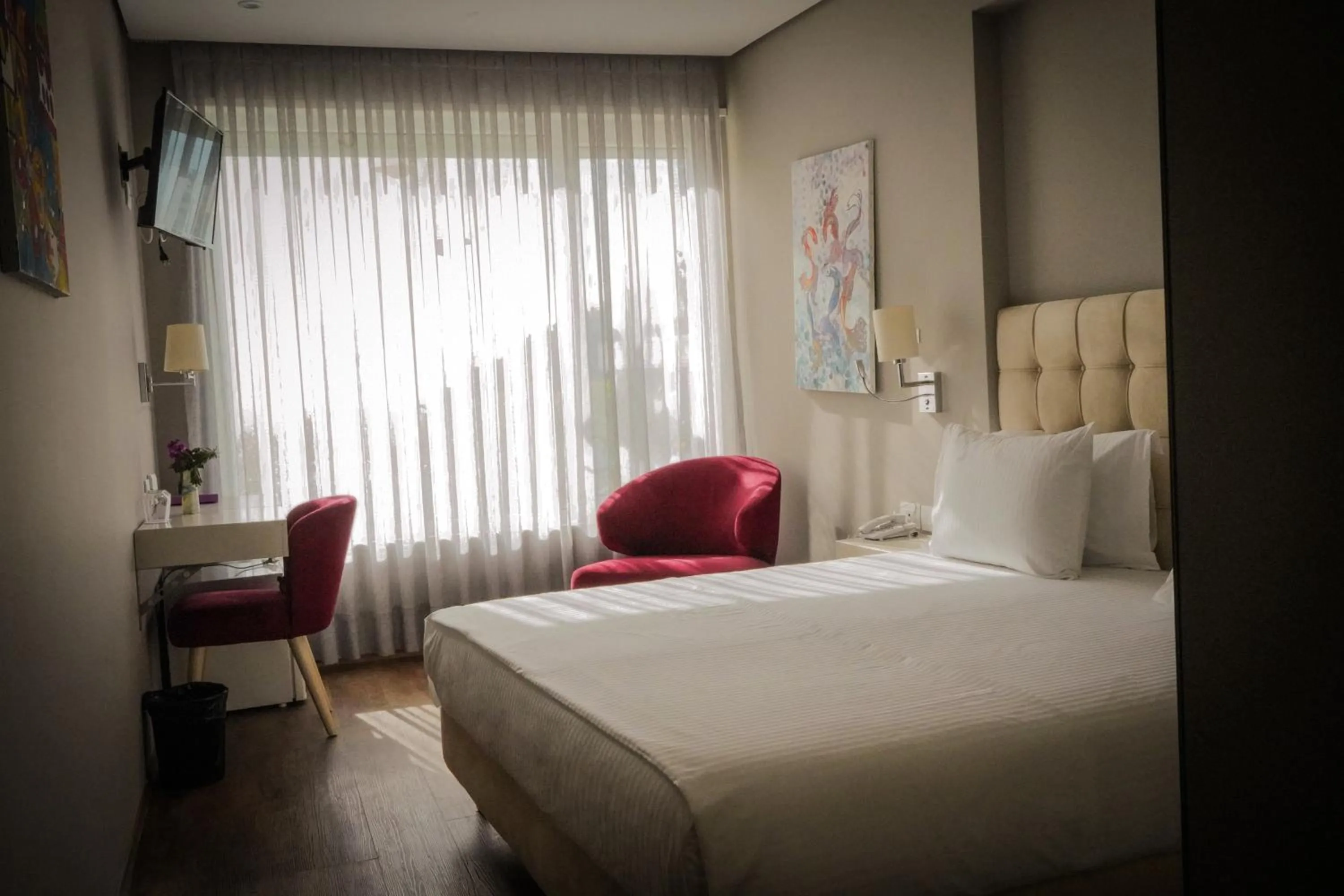 Bed in Bougainville Bay Hotel