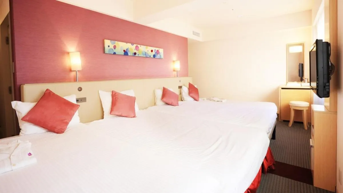 Photo of the whole room, Bed in Smile Hotel Naha City Resort