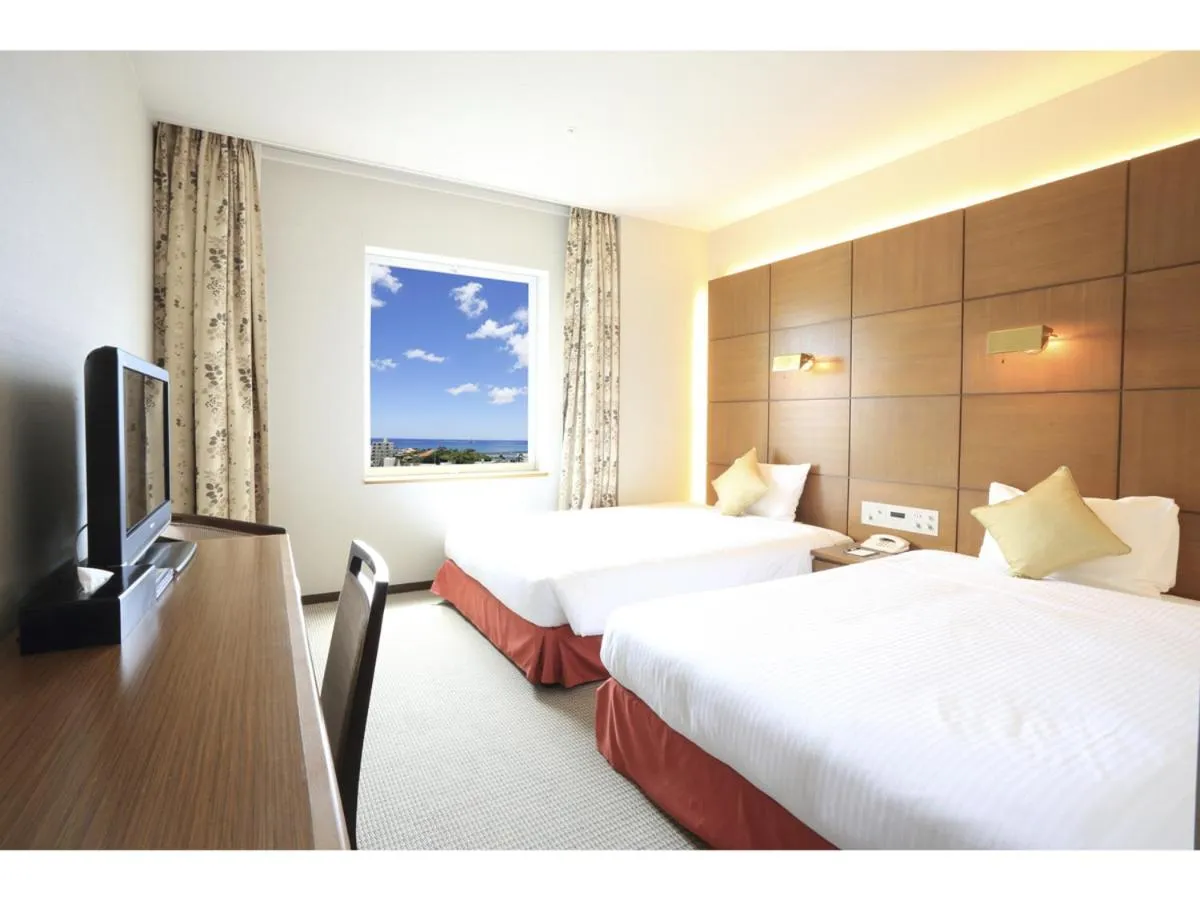 Photo of the whole room, Bed in Smile Hotel Naha City Resort