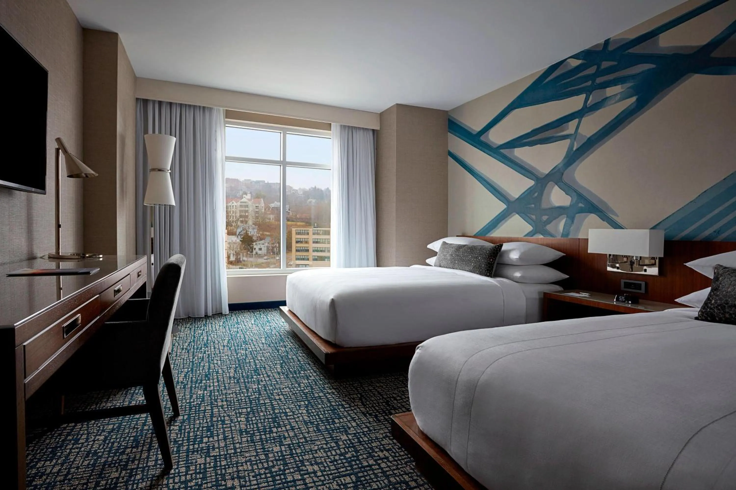 Photo of the whole room, Bed in Ithaca Marriott Downtown on the Commons