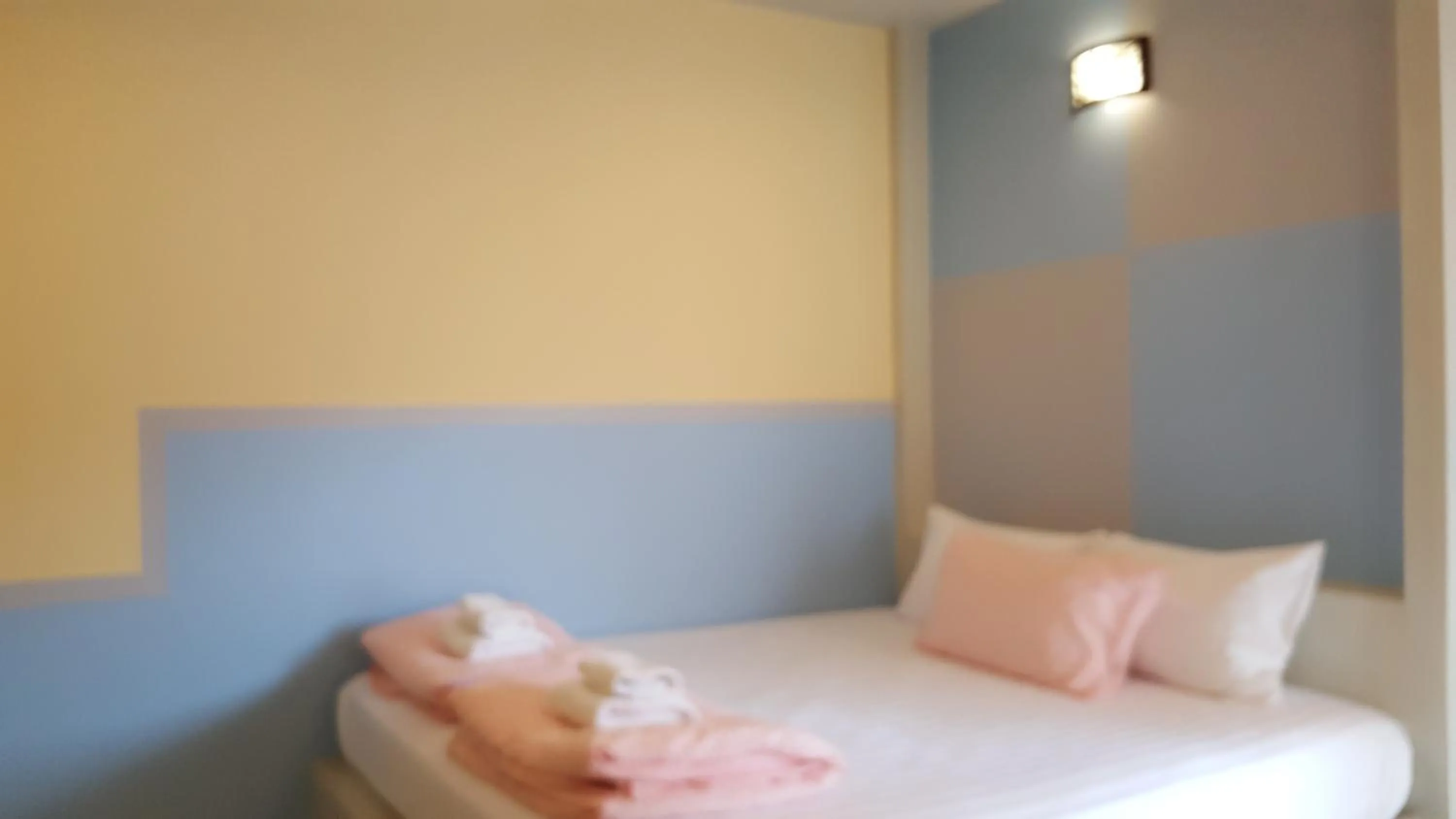 Bed in Juntima Place at Amphawa