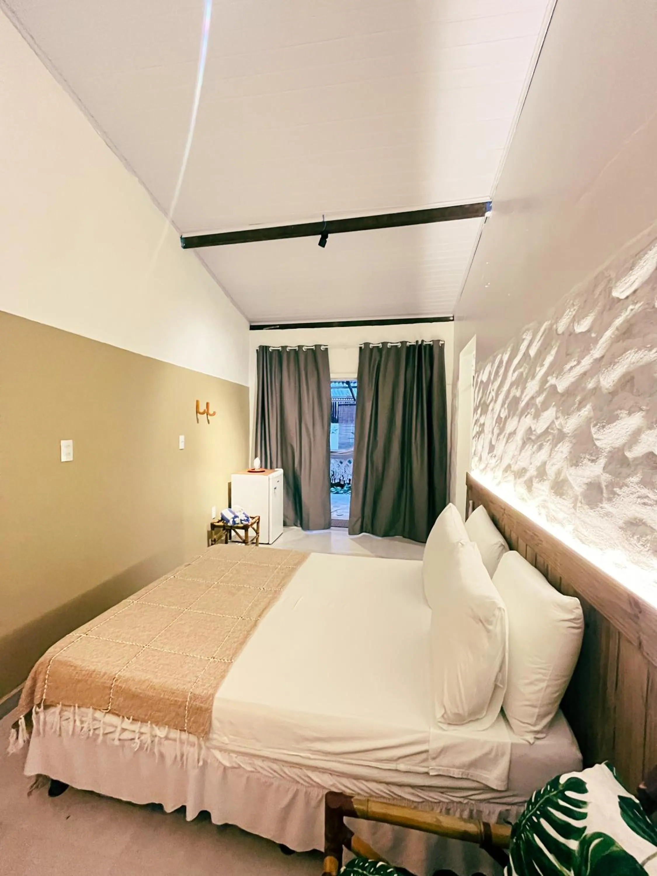 Bed in Pousada Nascente do Sol