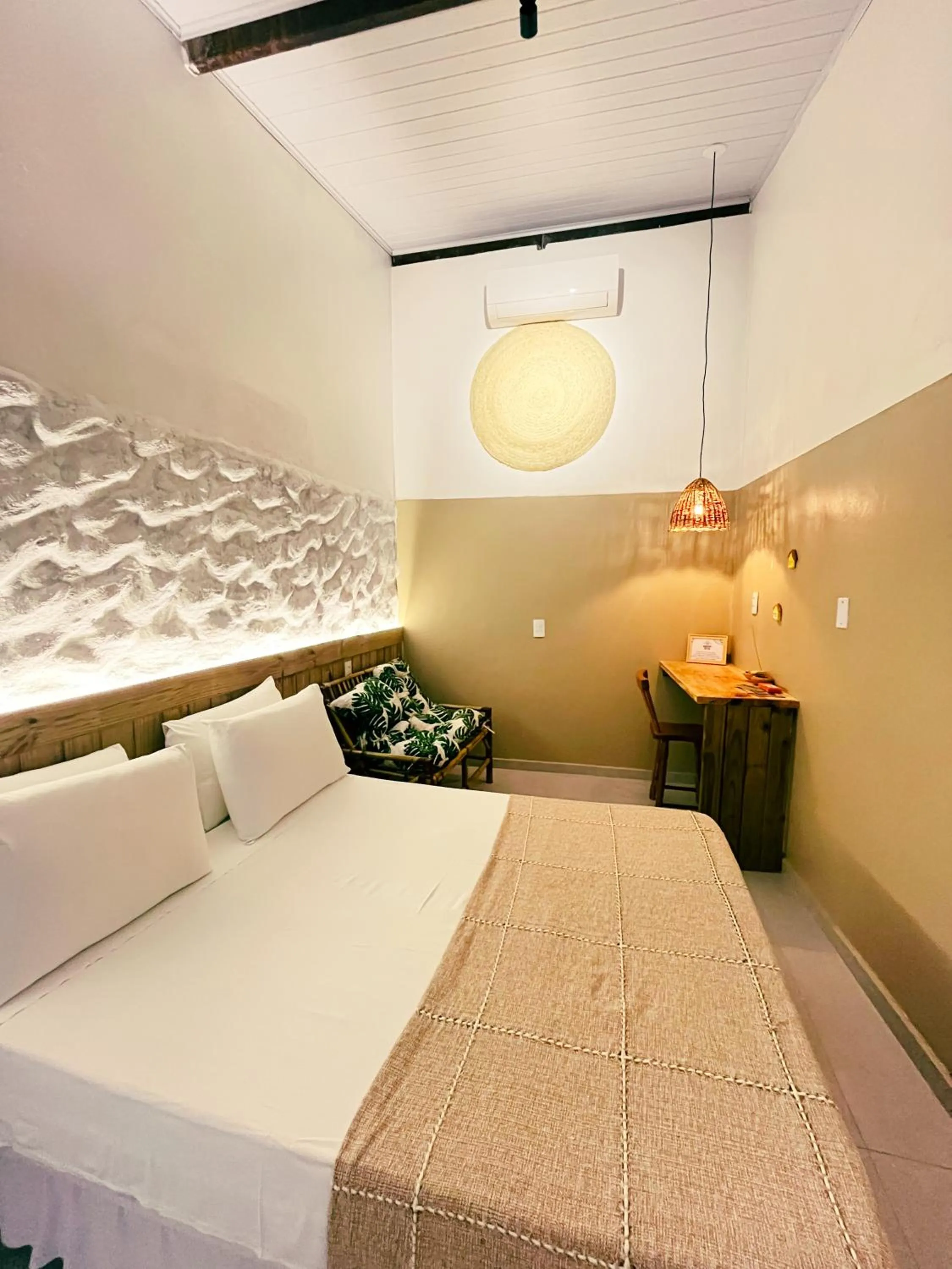 Bed in Pousada Nascente do Sol