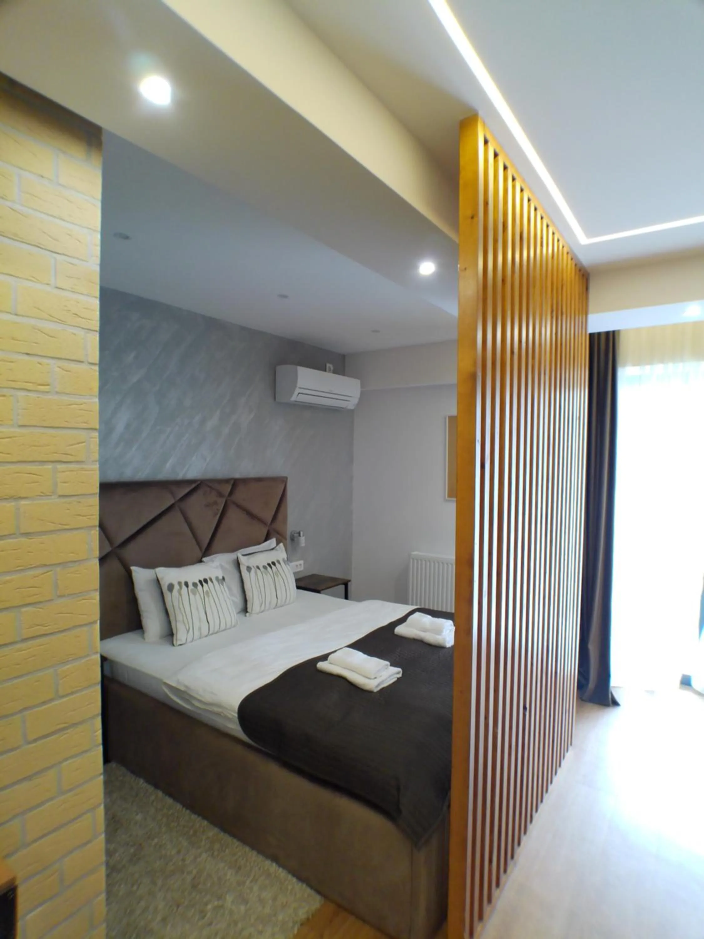 Bed in Upground Residence Apartments