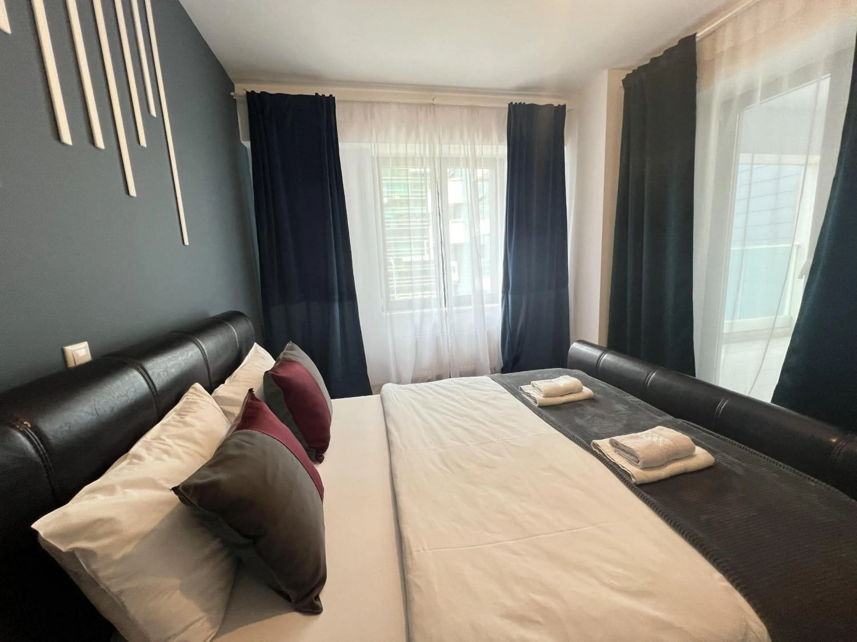 Bedroom, Bed in Upground Residence Apartments