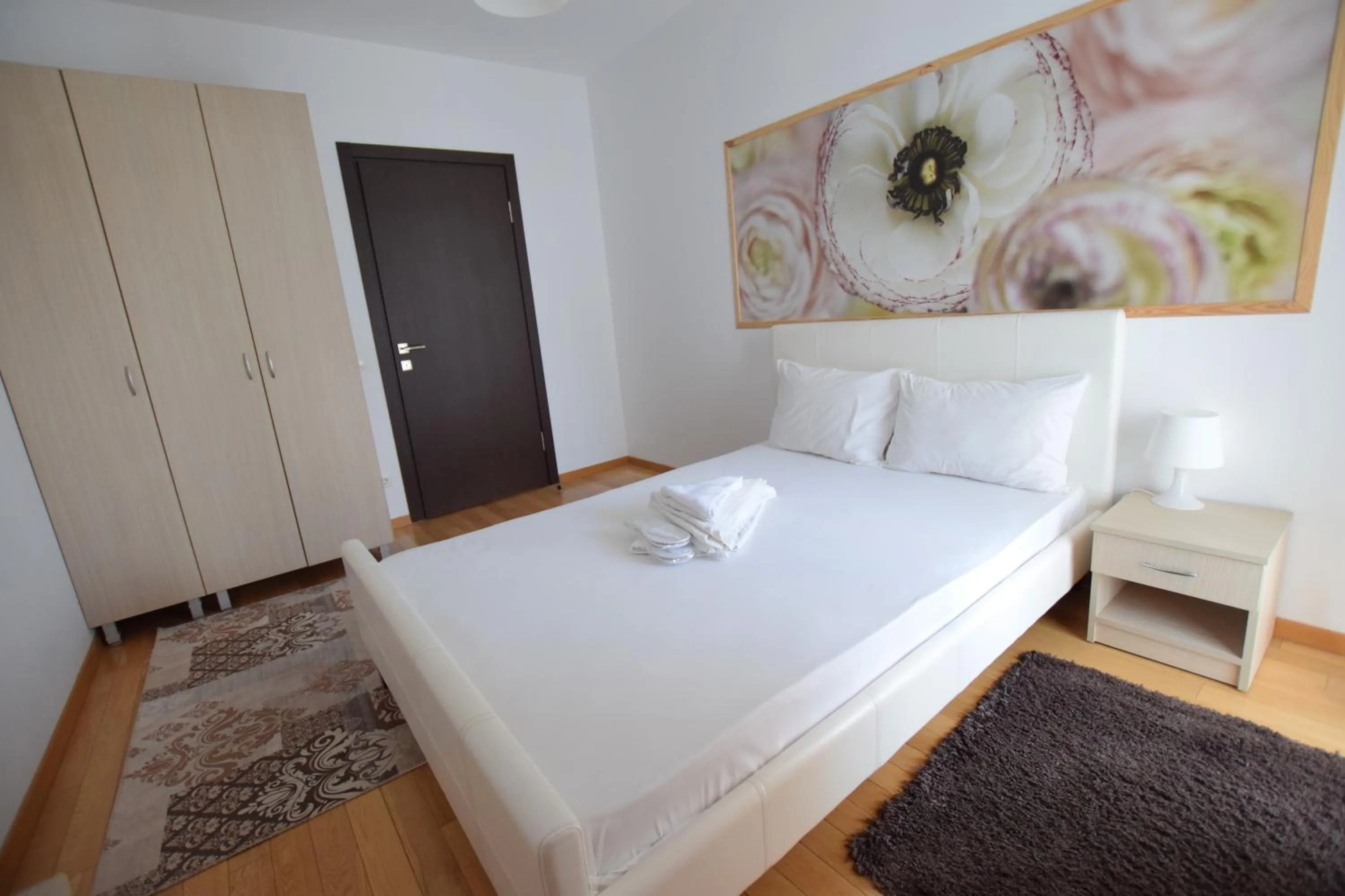 Bed in Upground Residence Apartments