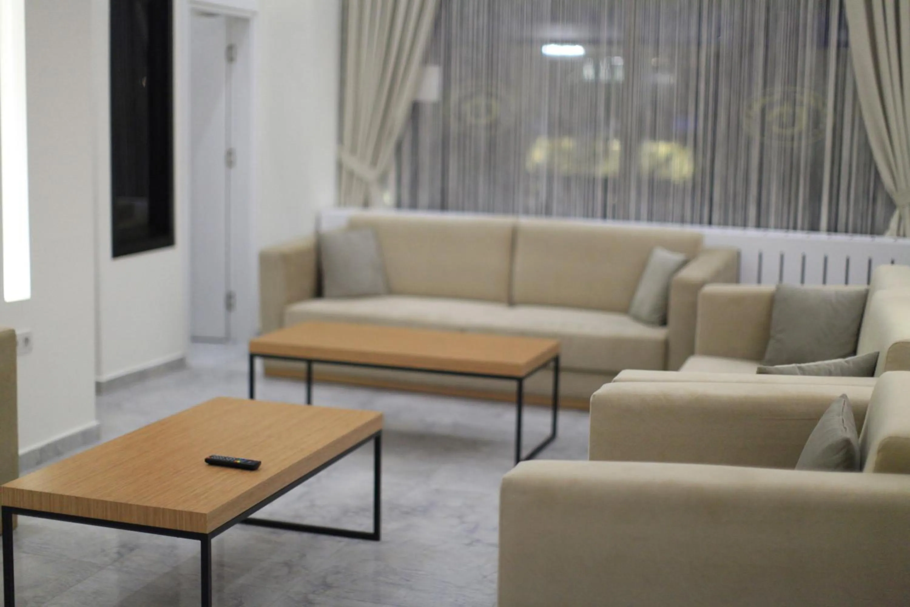 Communal lounge/ TV room in Okur Otel