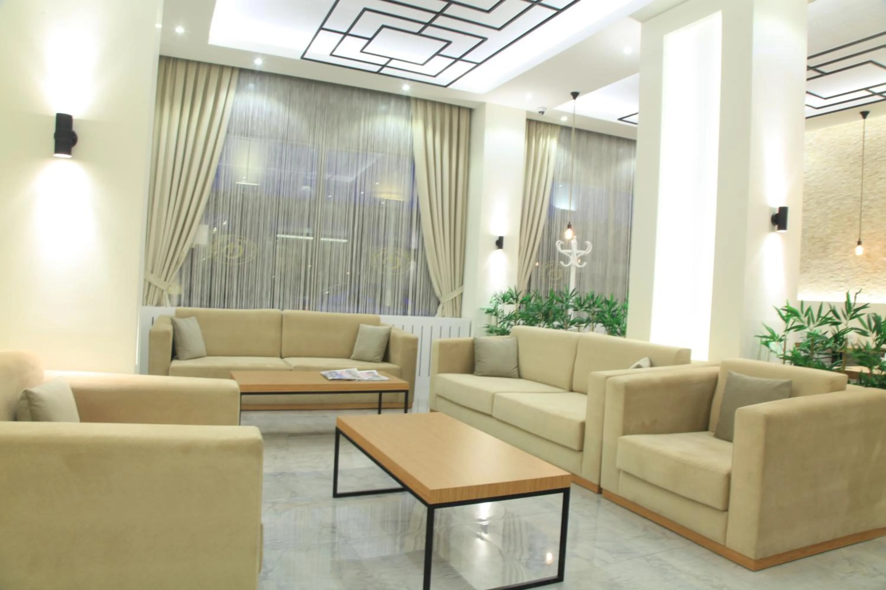 Communal lounge/ TV room in Okur Otel