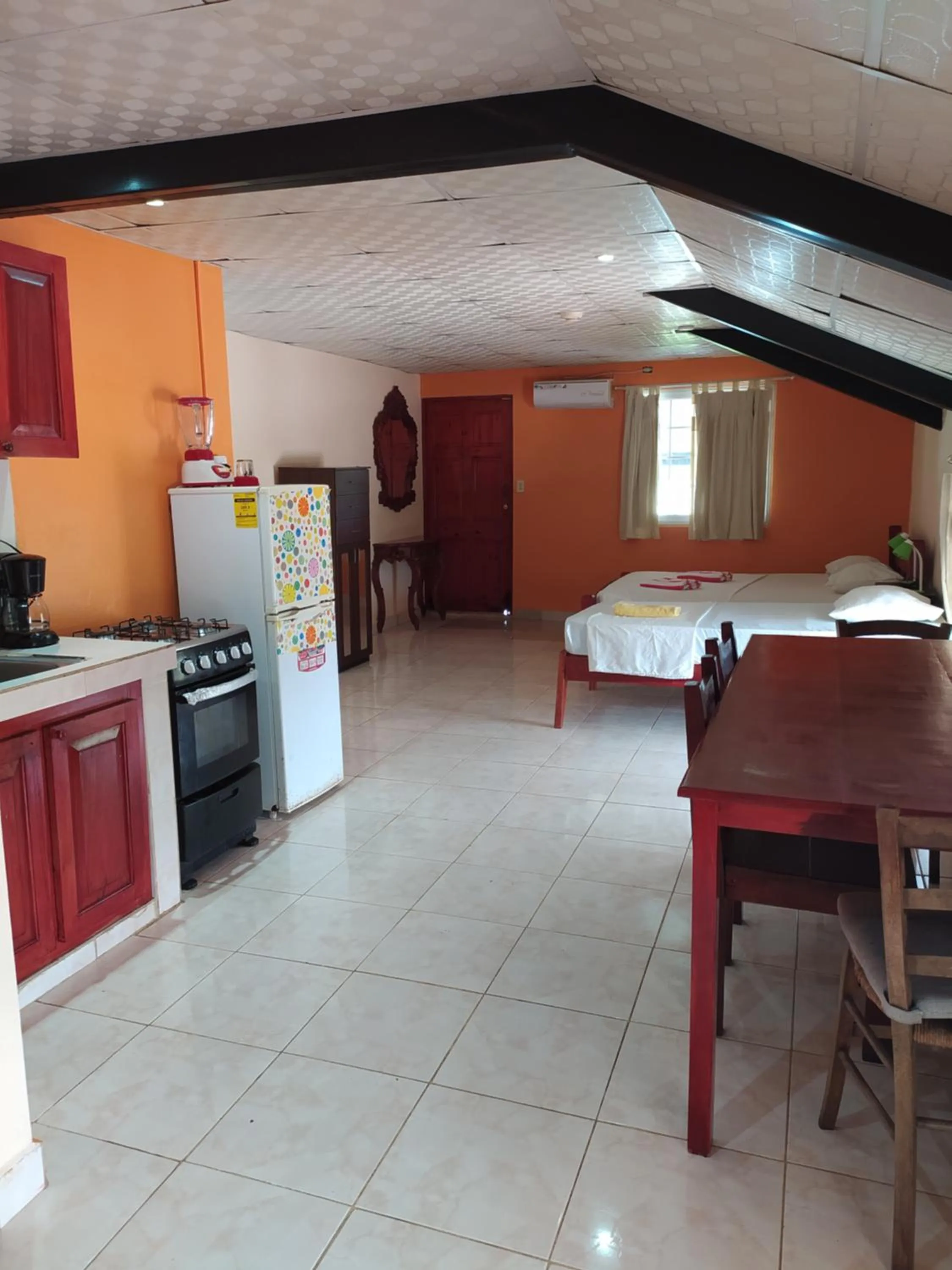 Kitchen or kitchenette in Sun Havens Apartments & Suites