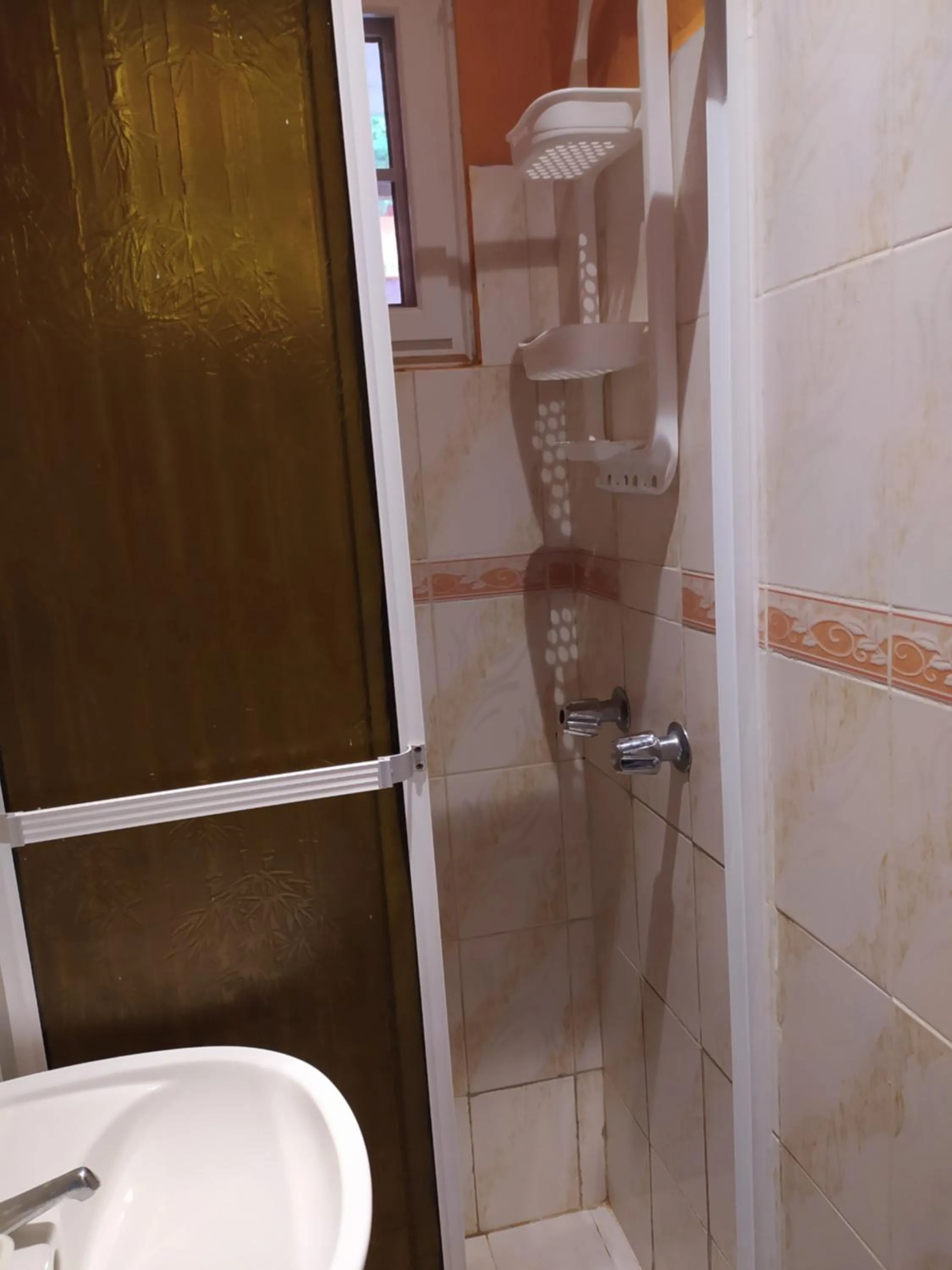 Shower in Sun Havens Apartments & Suites