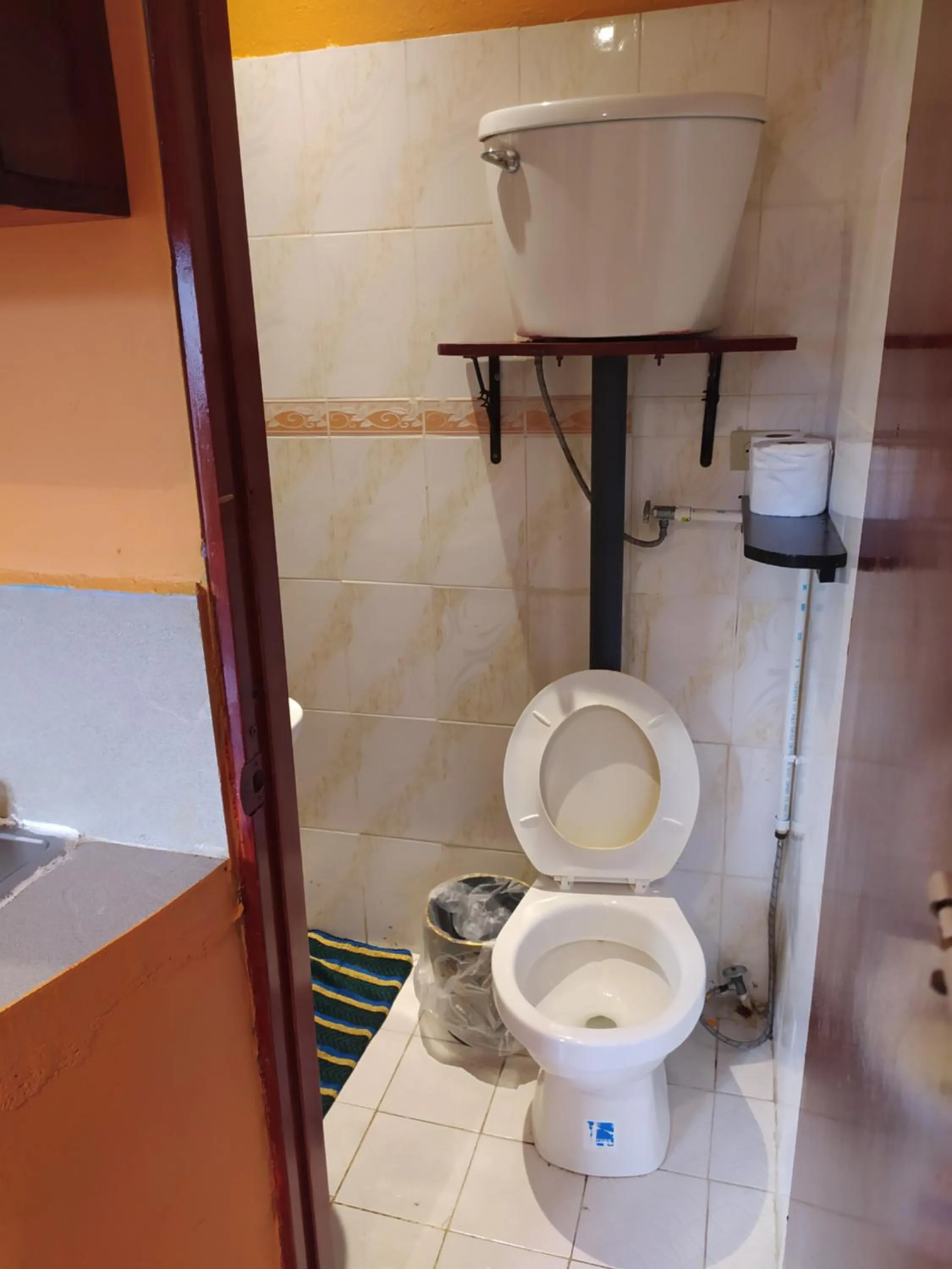 Toilet in Sun Havens Apartments & Suites