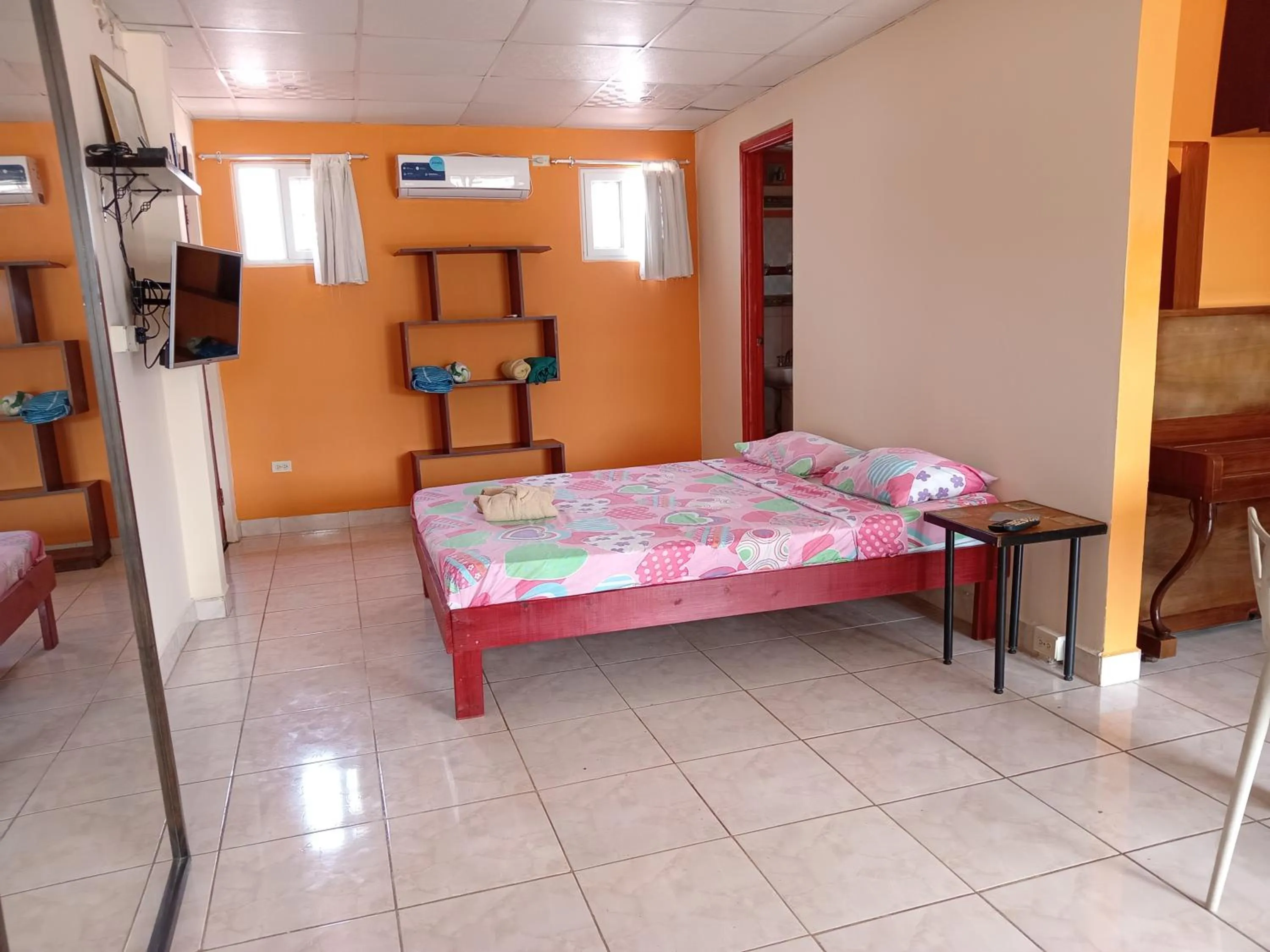 Bed in Sun Havens Apartments & Suites