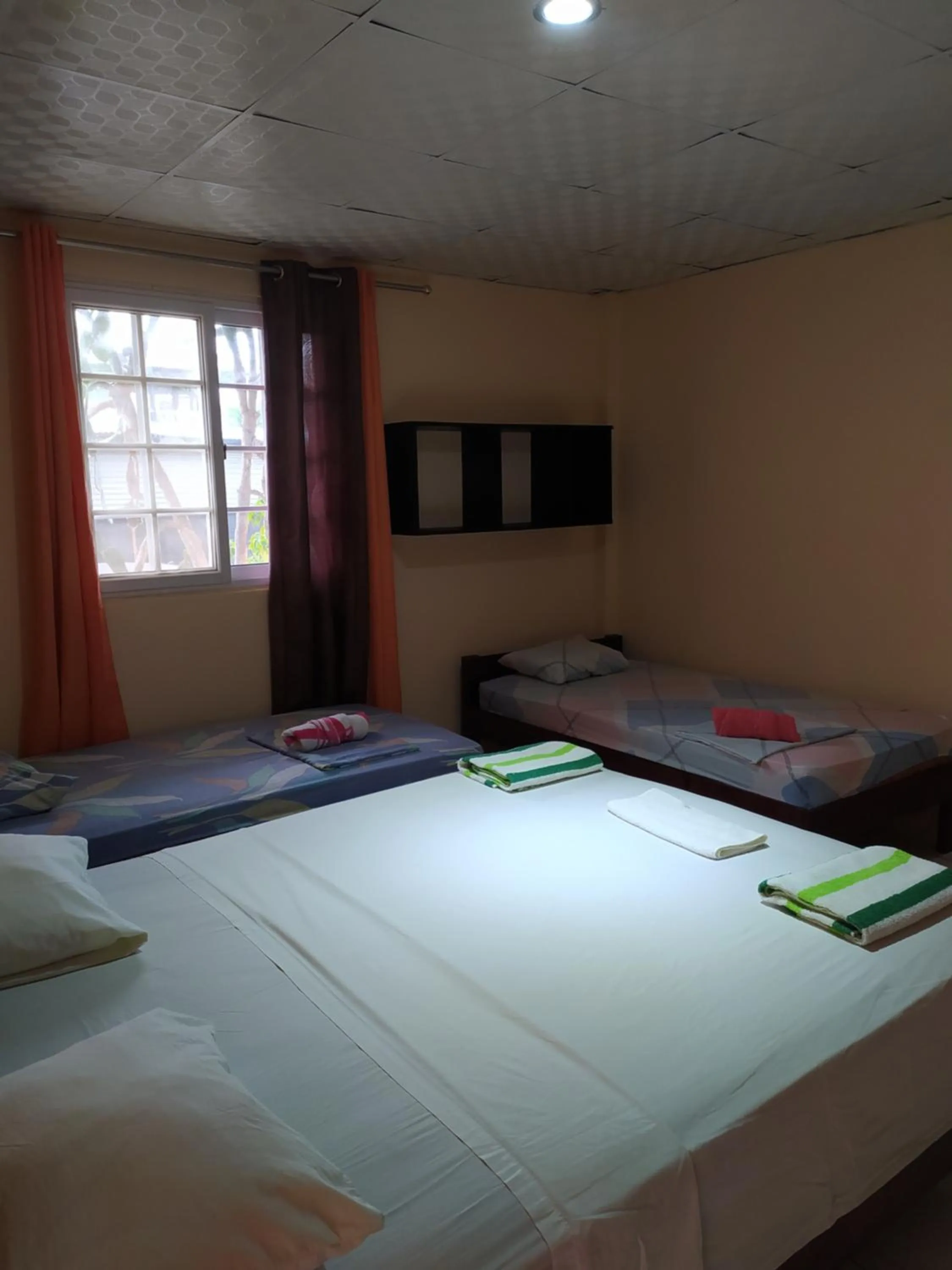 Bed in Sun Havens Apartments & Suites