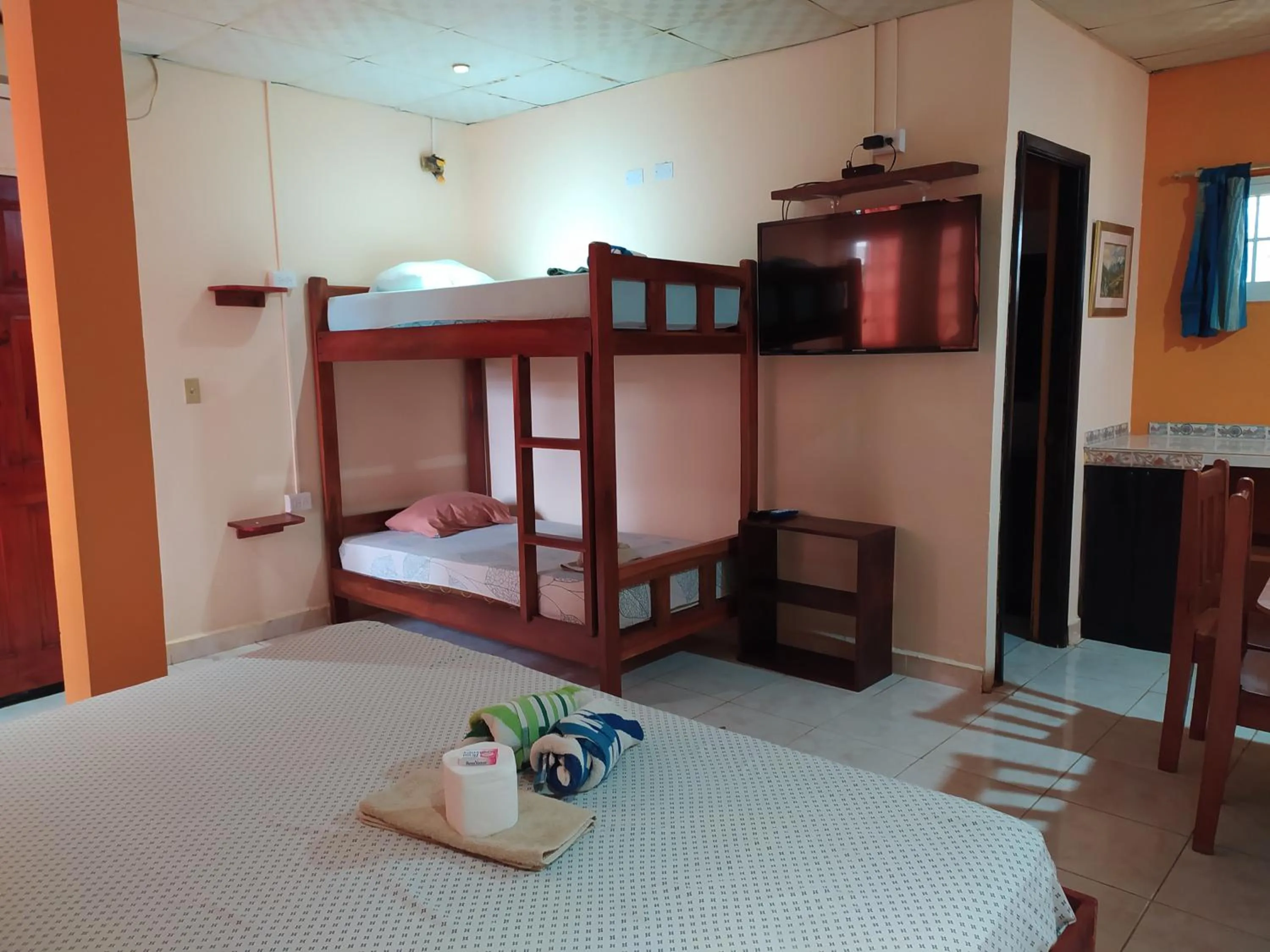 Bed in Sun Havens Apartments & Suites