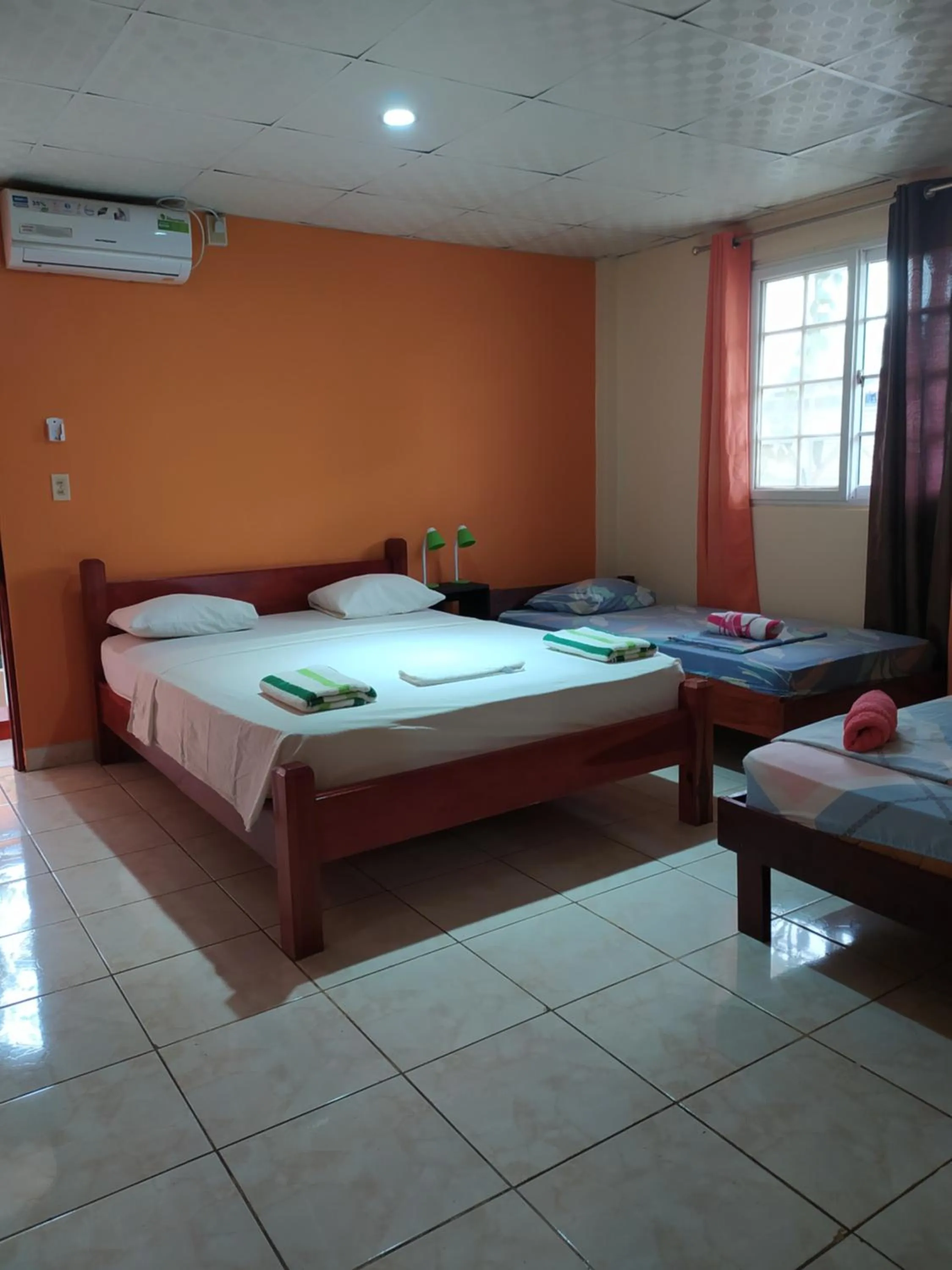 Bed in Sun Havens Apartments & Suites