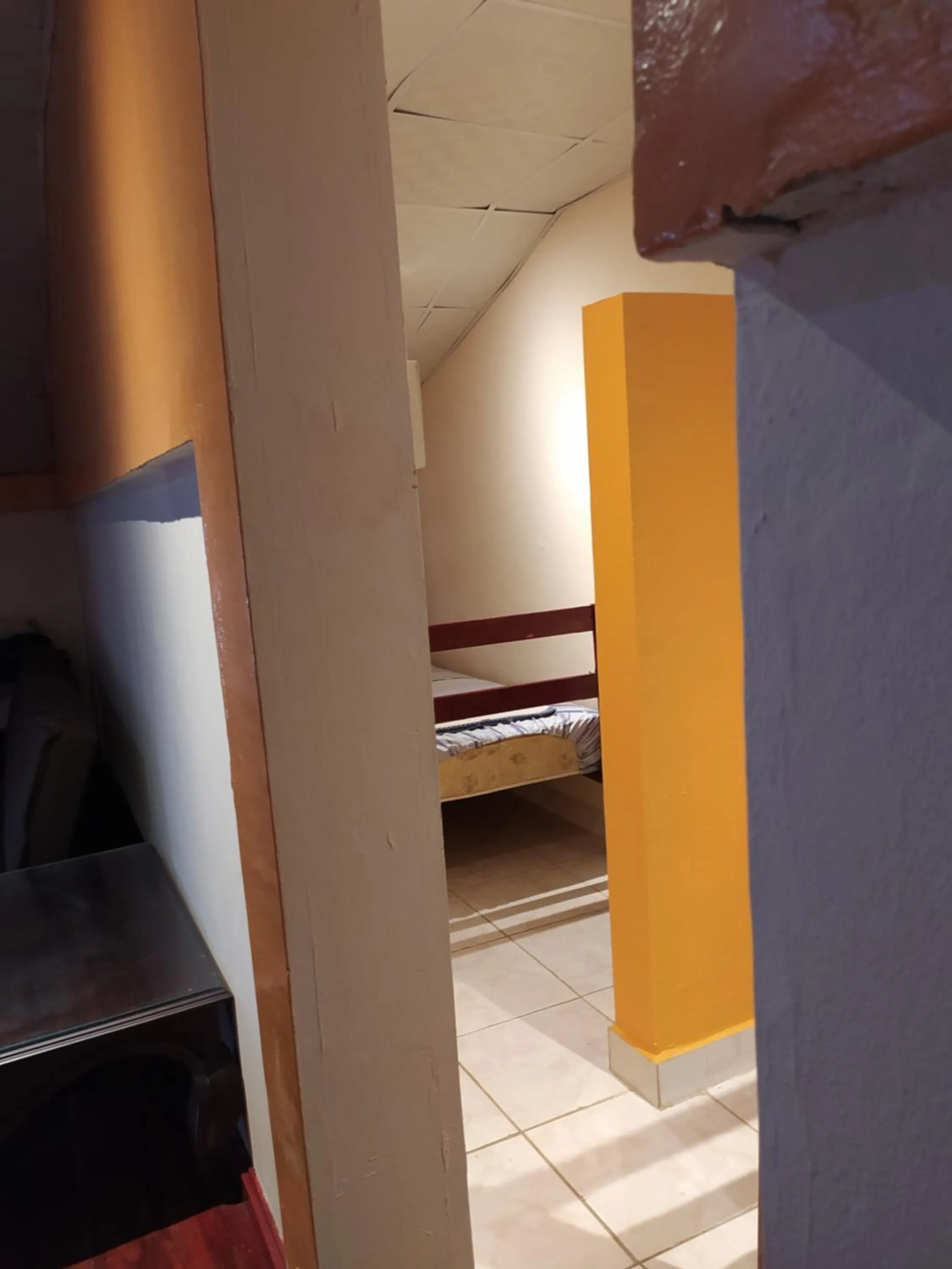 Bed in Sun Havens Apartments & Suites