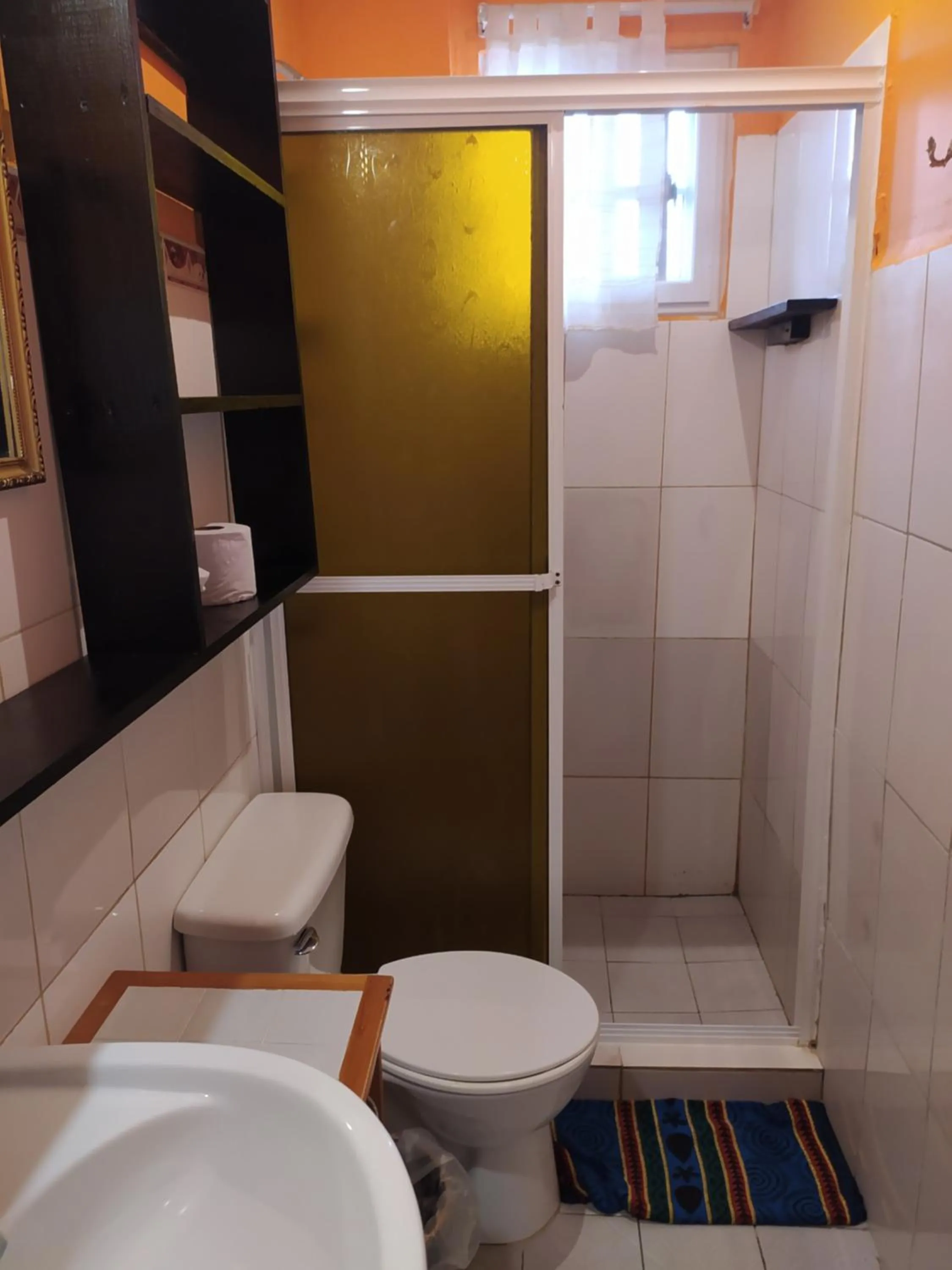 Shower in Sun Havens Apartments & Suites