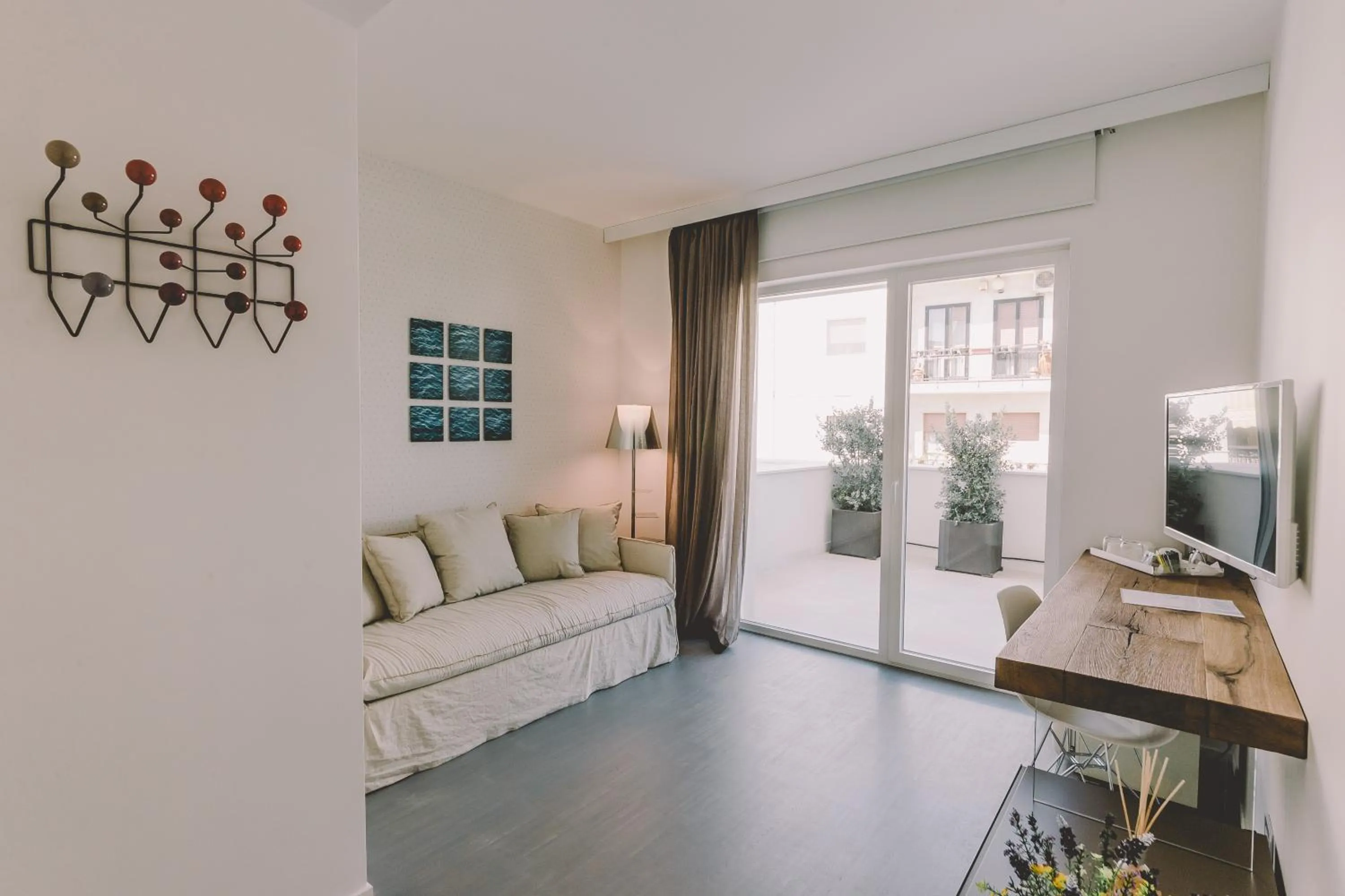 One-Bedroom Suite with Patio in Suite 10 Home Design & Spa