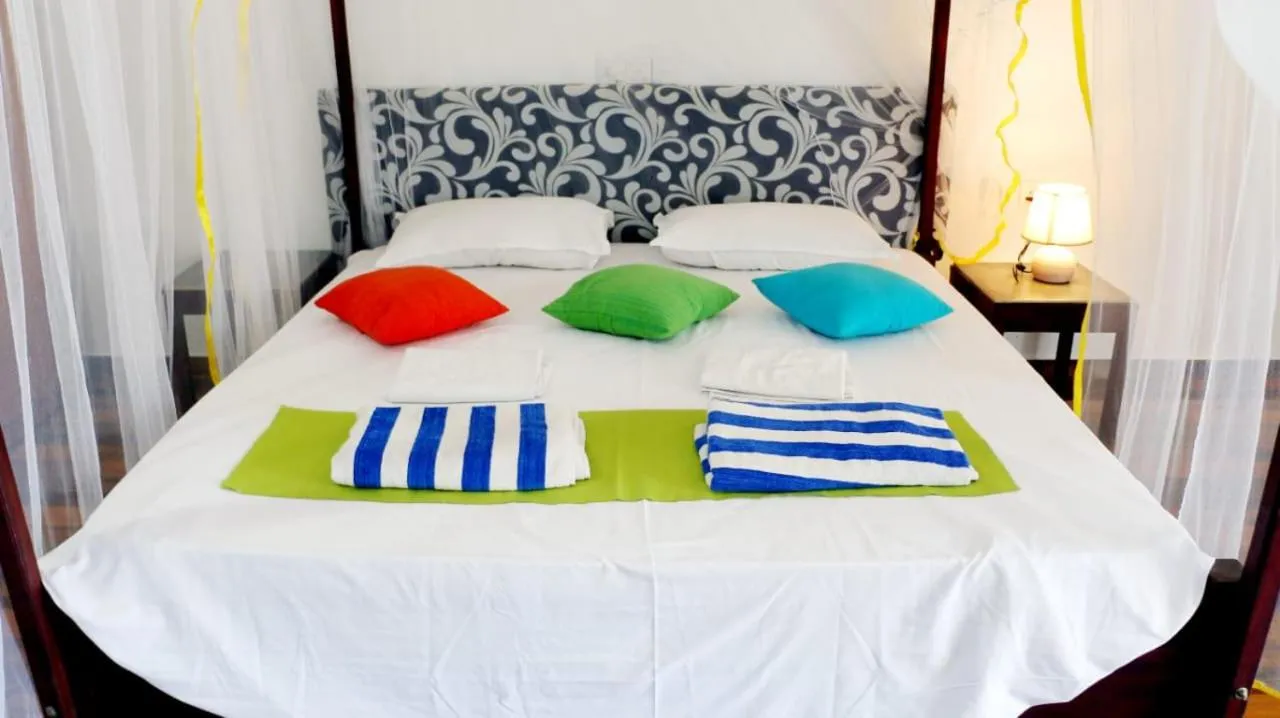 Bed in FEEL Beach Apartments