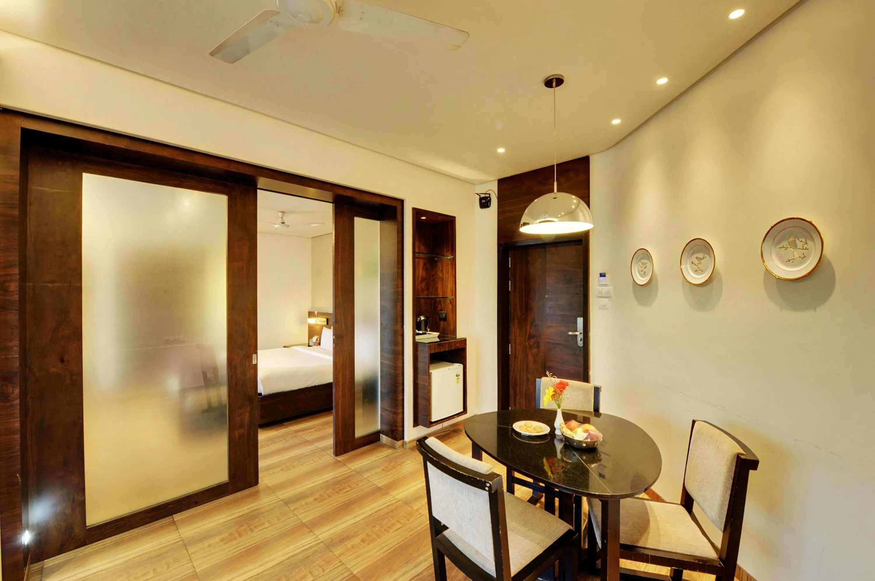 Living room, Bed in Hotel Sankam Residency