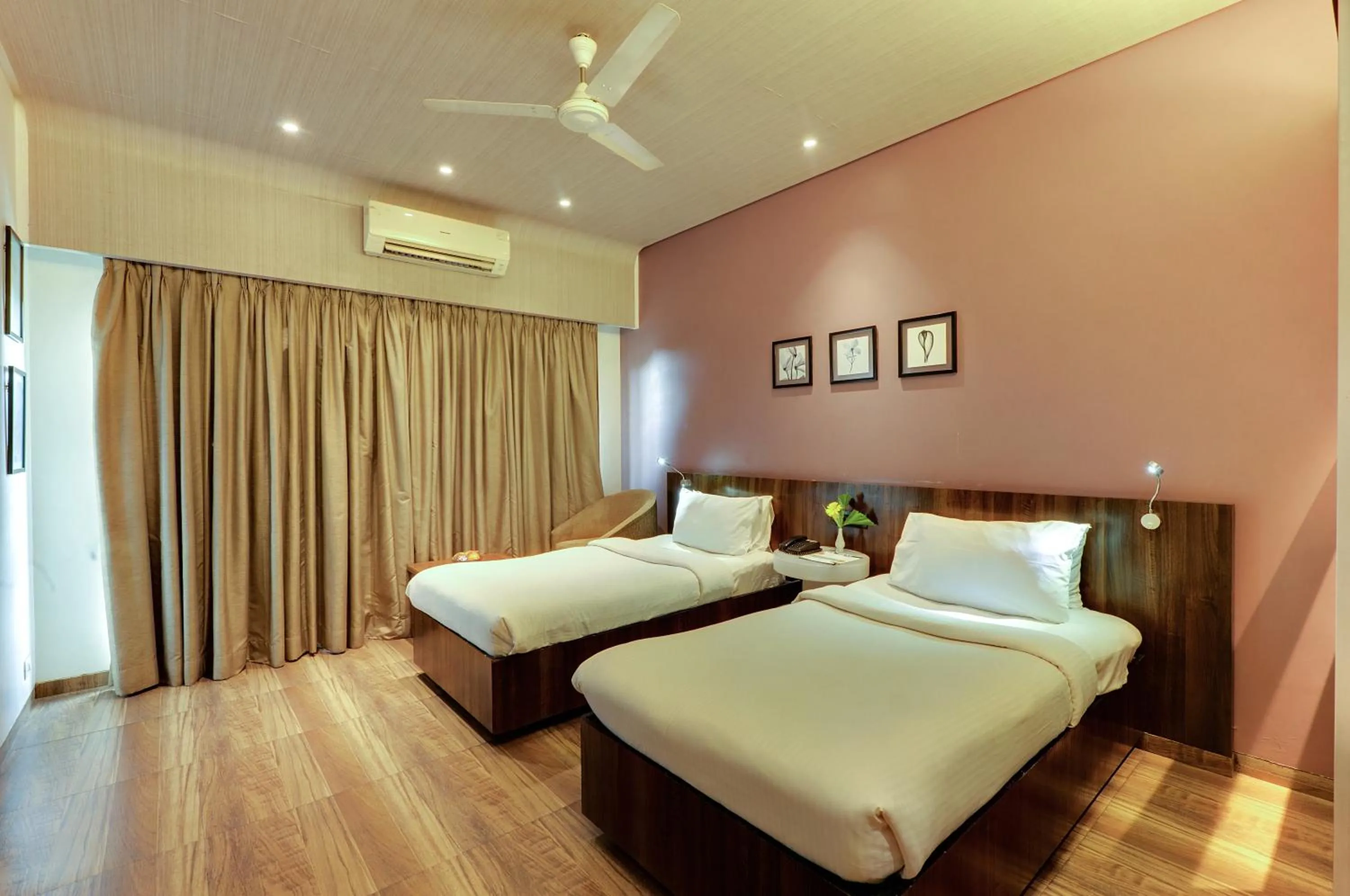 Bed in Hotel Sankam Residency