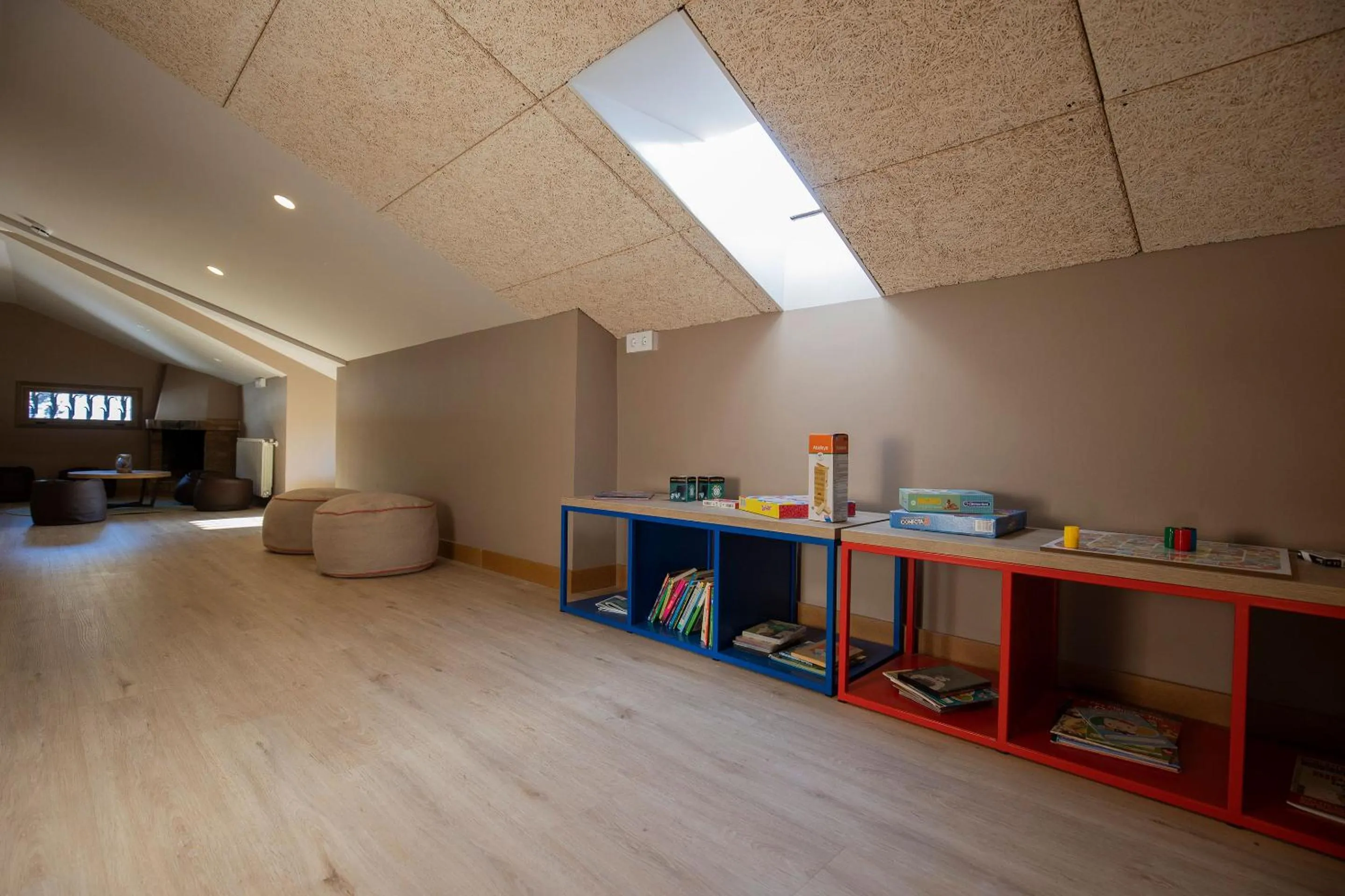 Communal lounge/ TV room in Font Andorra Hostel by Nexta