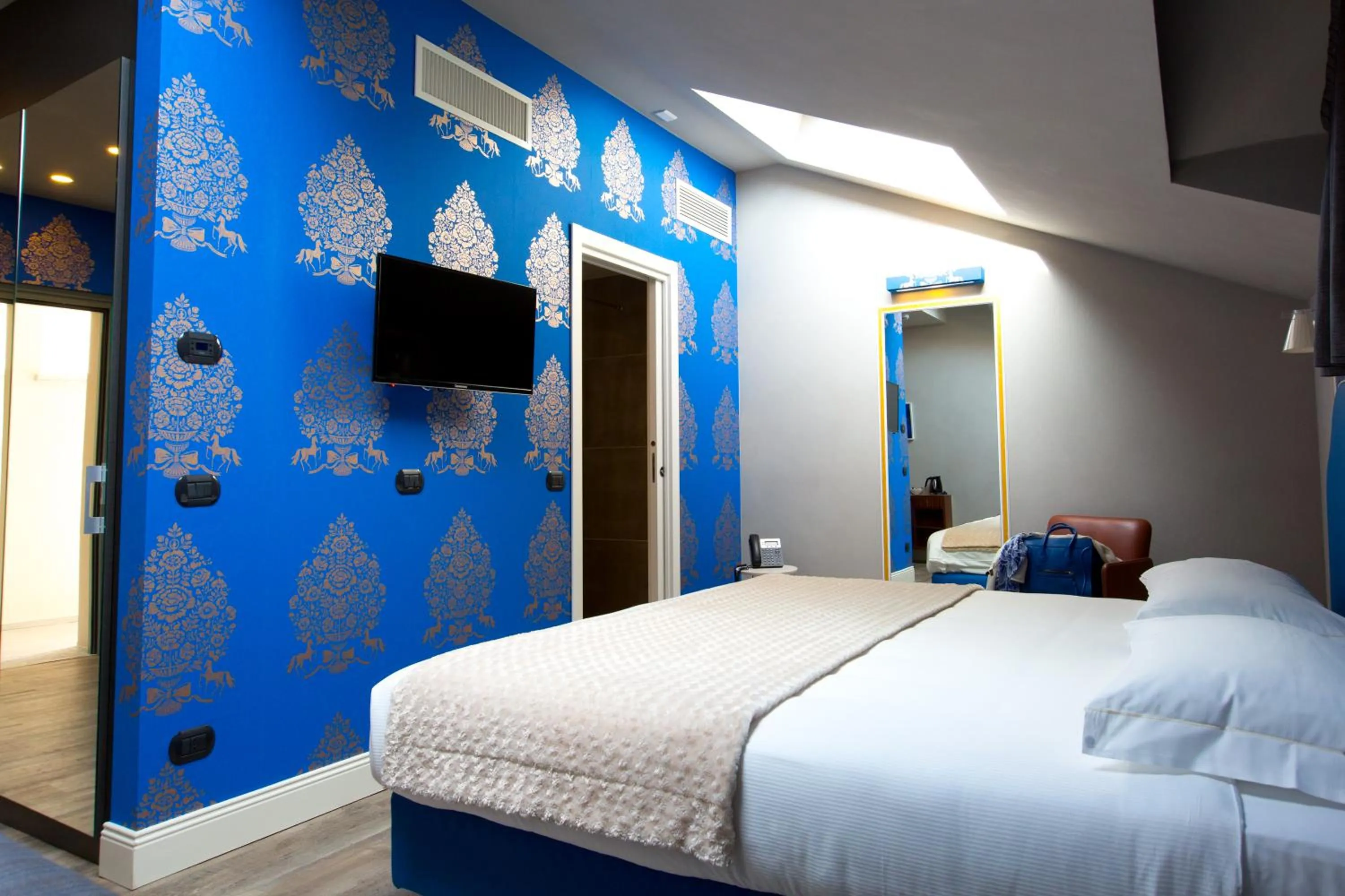 Decorative detail, Bed in Hotel Al Campanile - Luxury Suites & Apartments