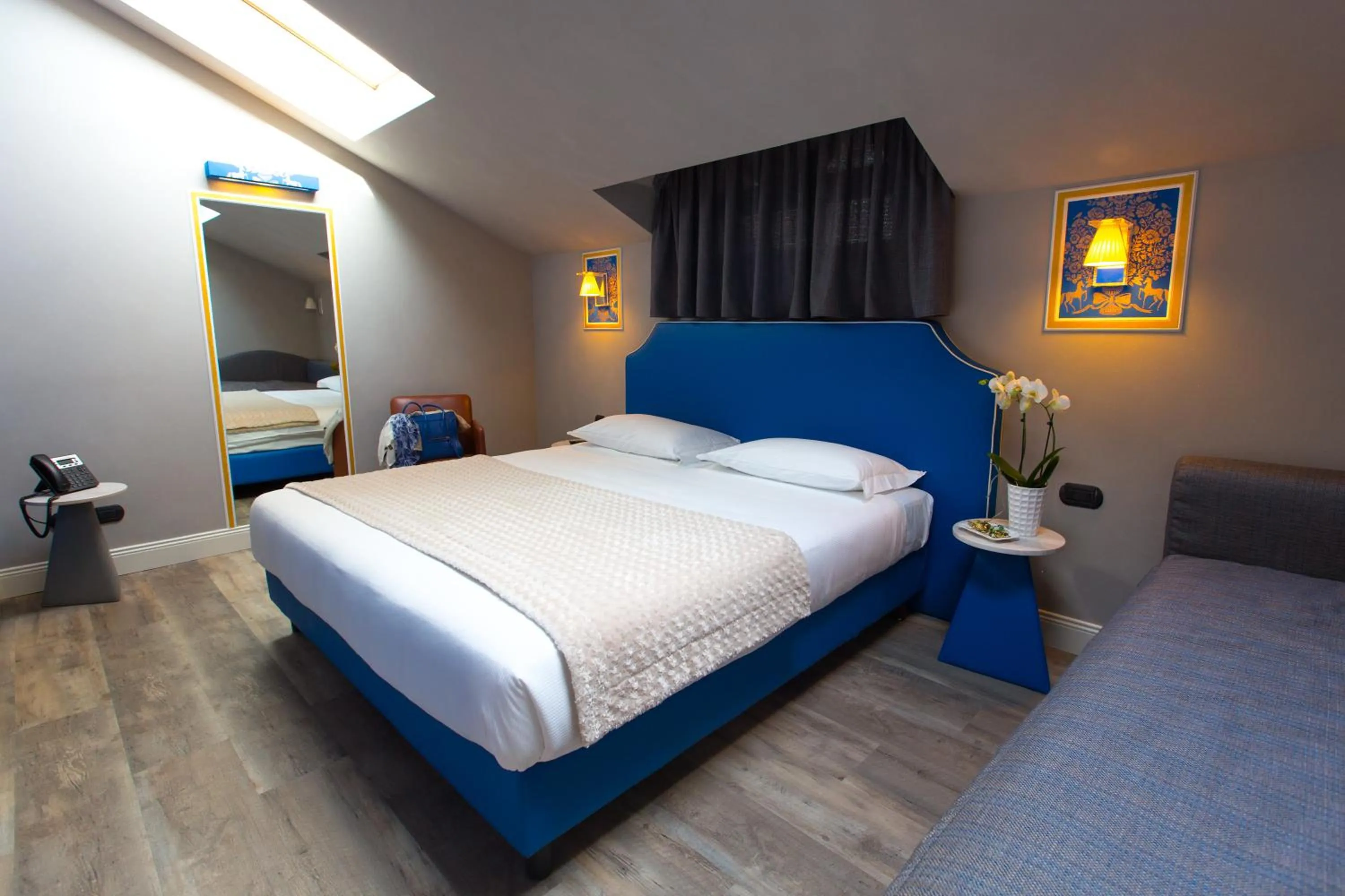 Bed in Hotel Al Campanile - Luxury Suites & Apartments